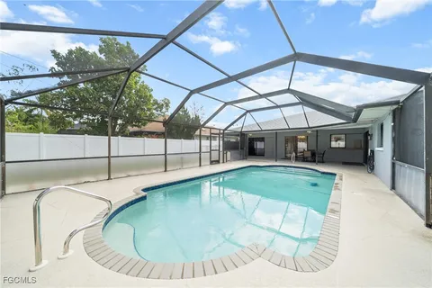 a view of a swimming pool with a porch