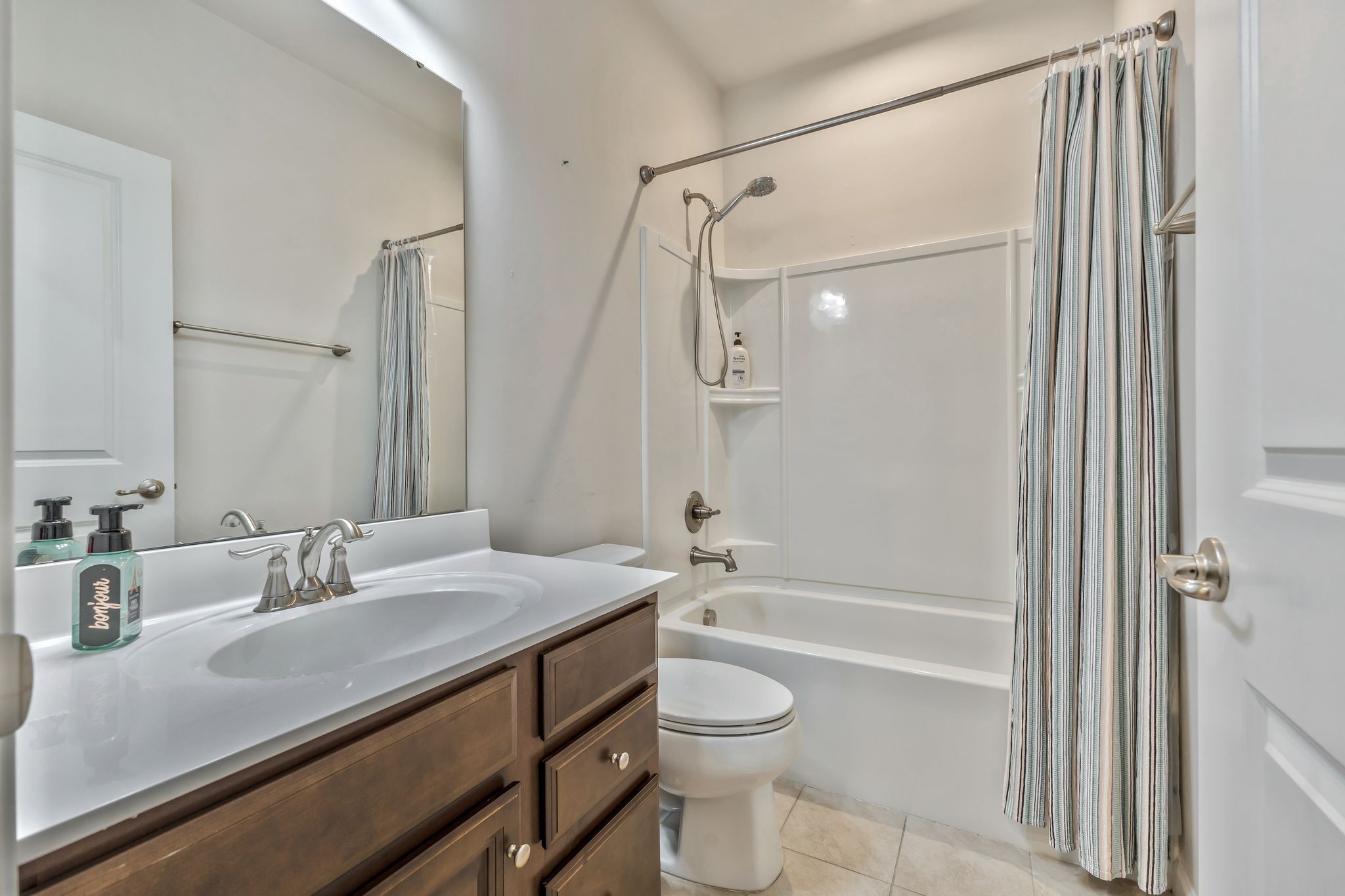 3793 Pin Hook Road Antioch, TN 37013 - Photo 16 of 30 a bathroom with a granite countertop sink toilet and shower