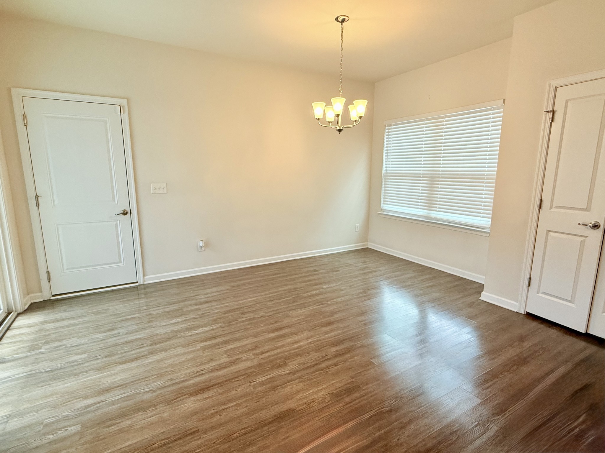 3793 Pin Hook Road Antioch, TN 37013 - Photo 23 of 30 an empty room with wooden floor and windows