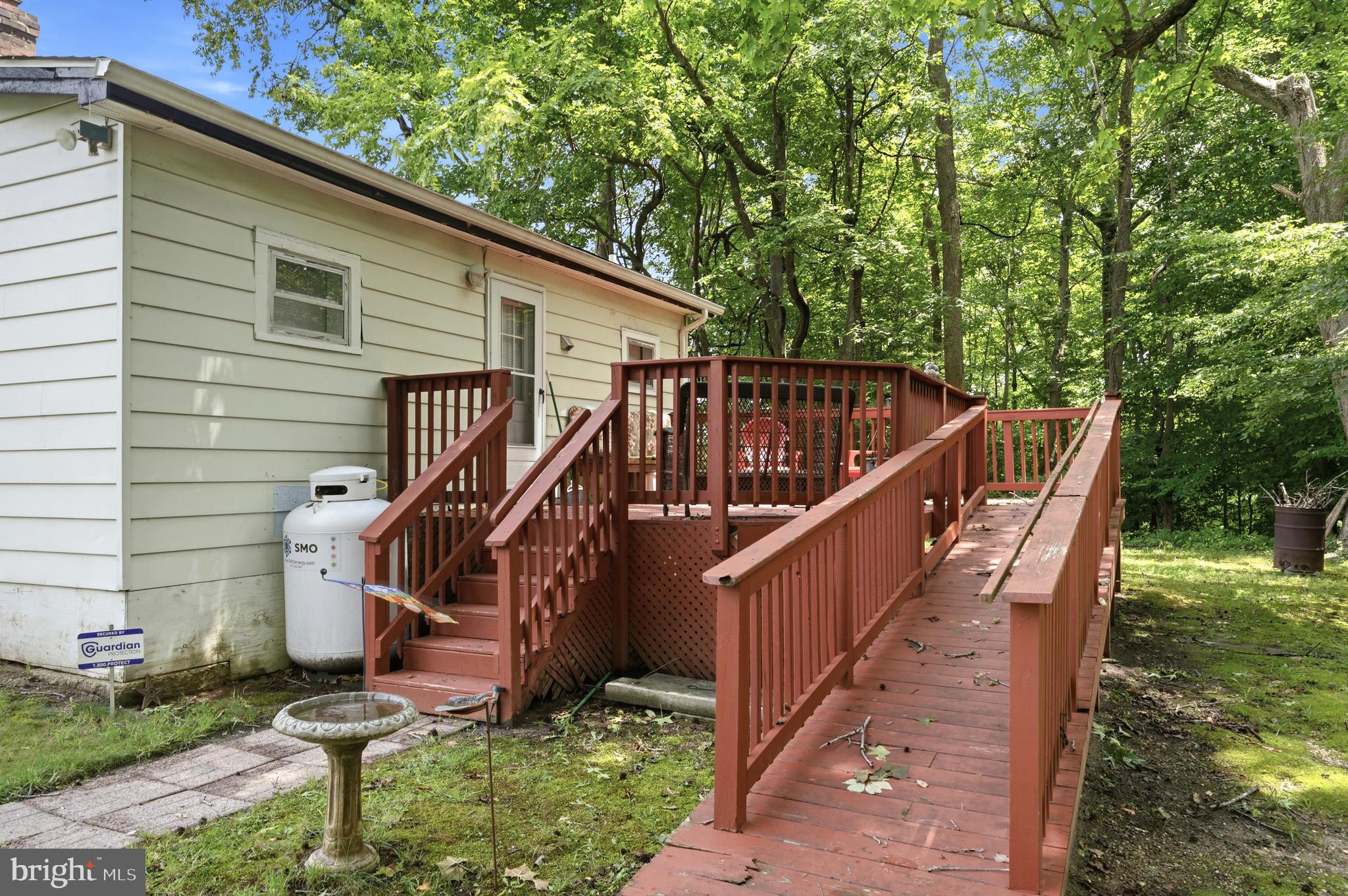 3009 Ponds Wood Road Huntingtown, MD 20639 - Photo 7 of 54 Charming and practical patio and ramp.