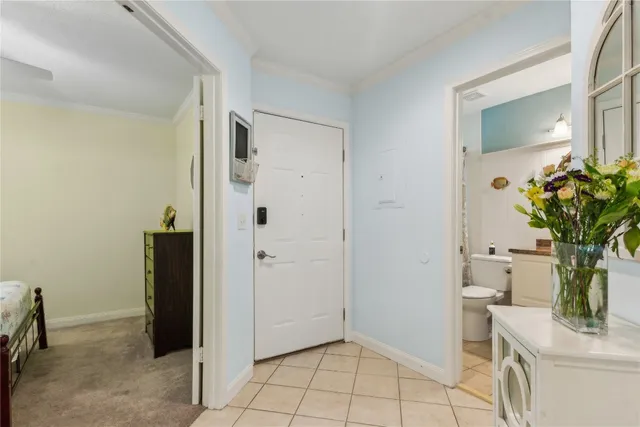 a view of a hallway and dining room