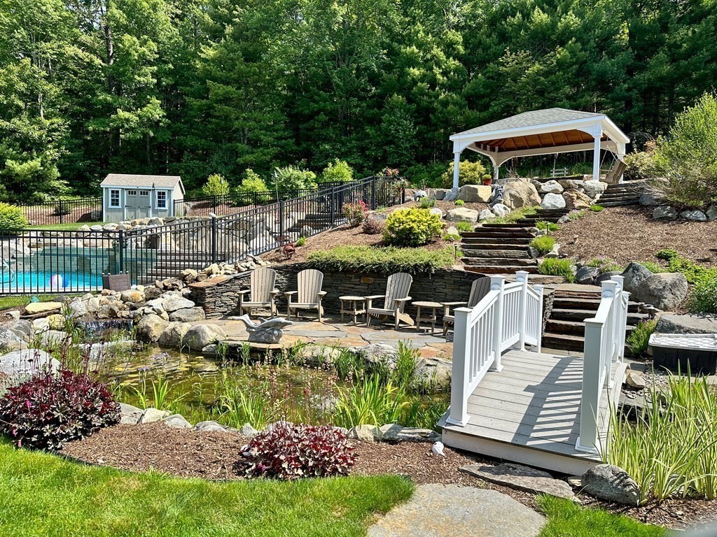 171 Scantic Road Hampden, MA 01036 - Photo 29 of 42 a front view of a house with garden