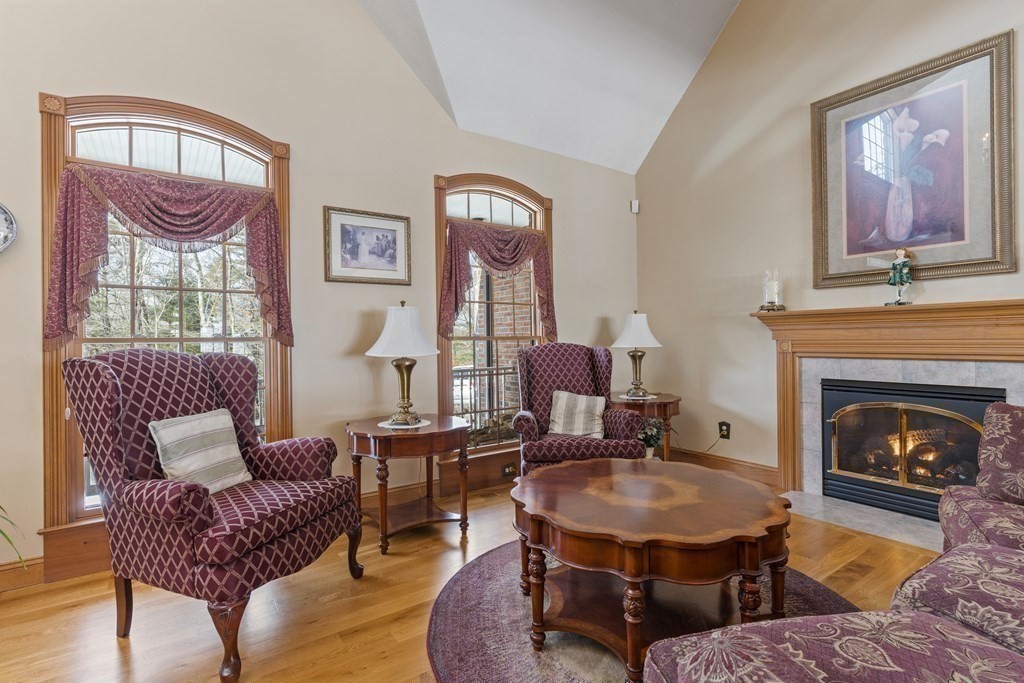 171 Scantic Road Hampden, MA 01036 - Photo 5 of 42 a living room with furniture and a fireplace