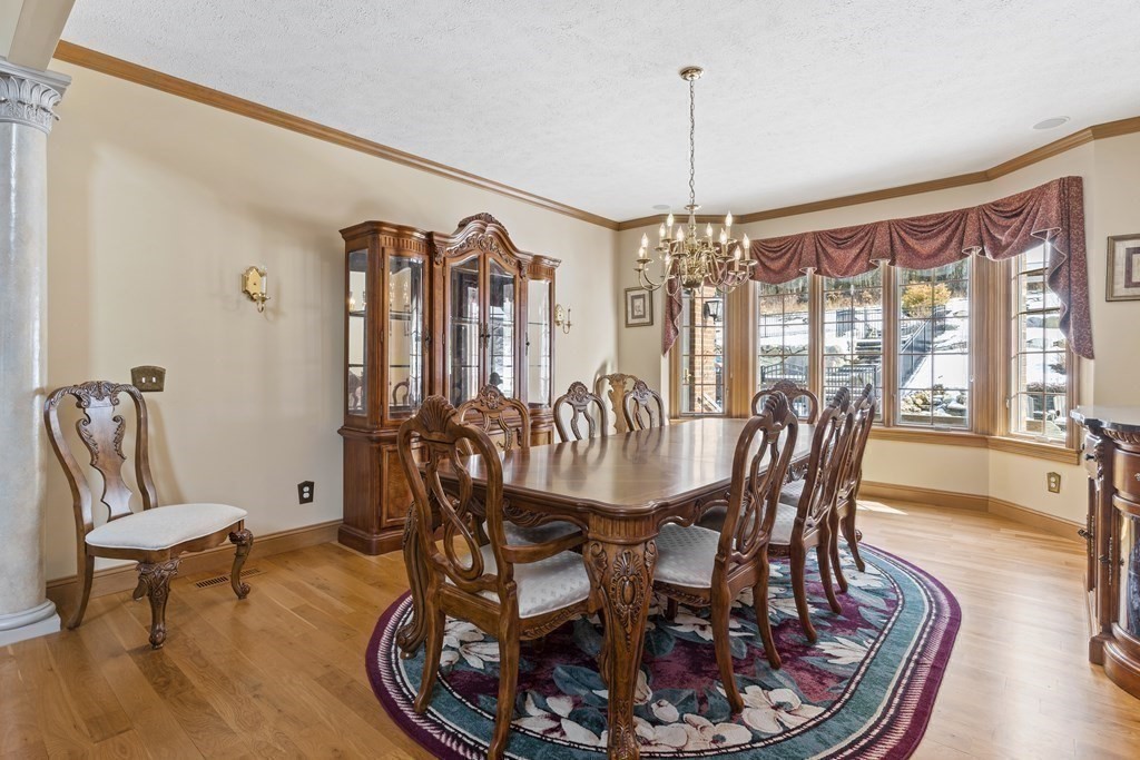 171 Scantic Road Hampden, MA 01036 - Photo 10 of 42 a view of a dining room with furniture window and wooden floor