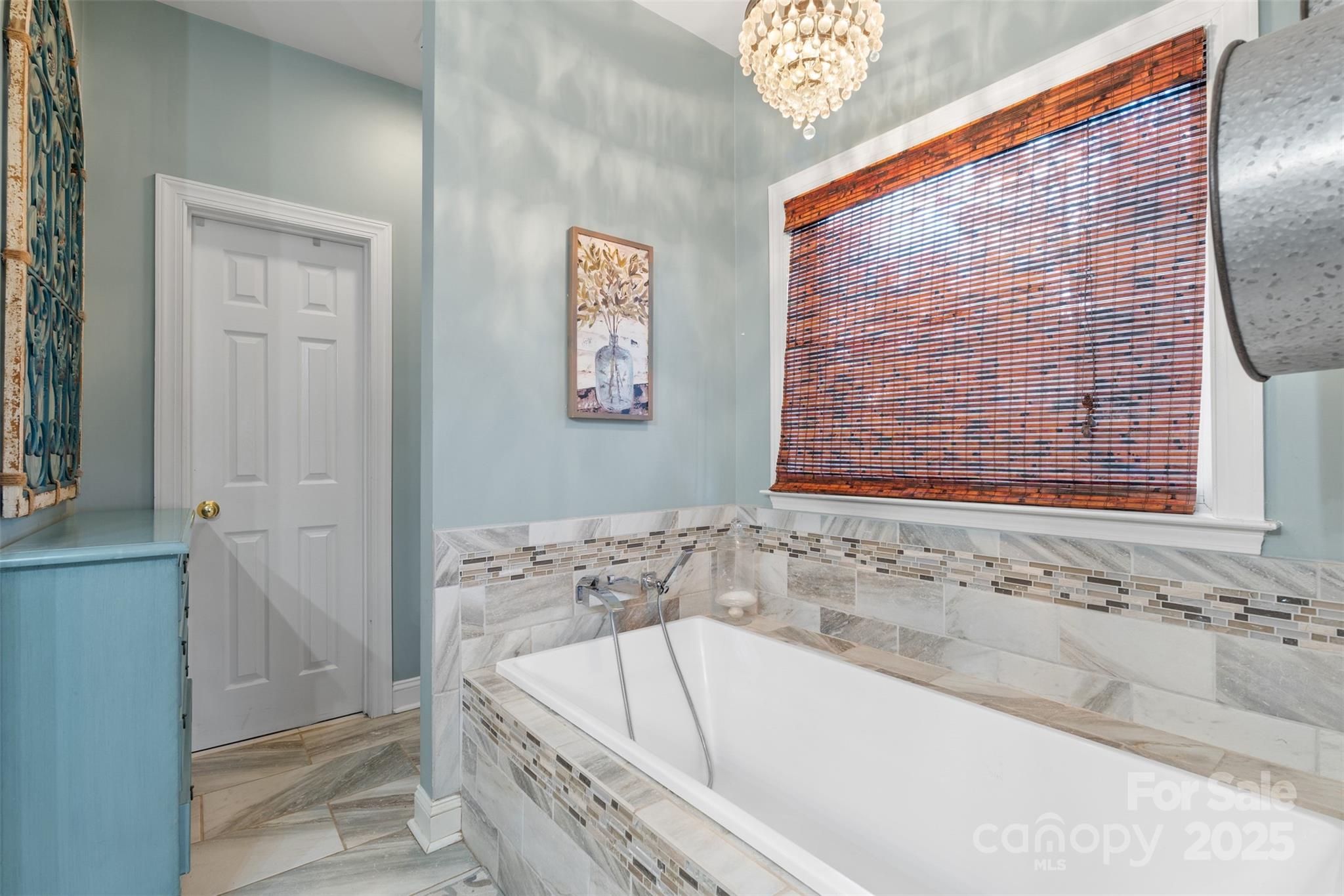 1135 Ben Black Road Midland, NC 28107 - Photo 15 of 38 a bathroom with a bathtub and a shower
