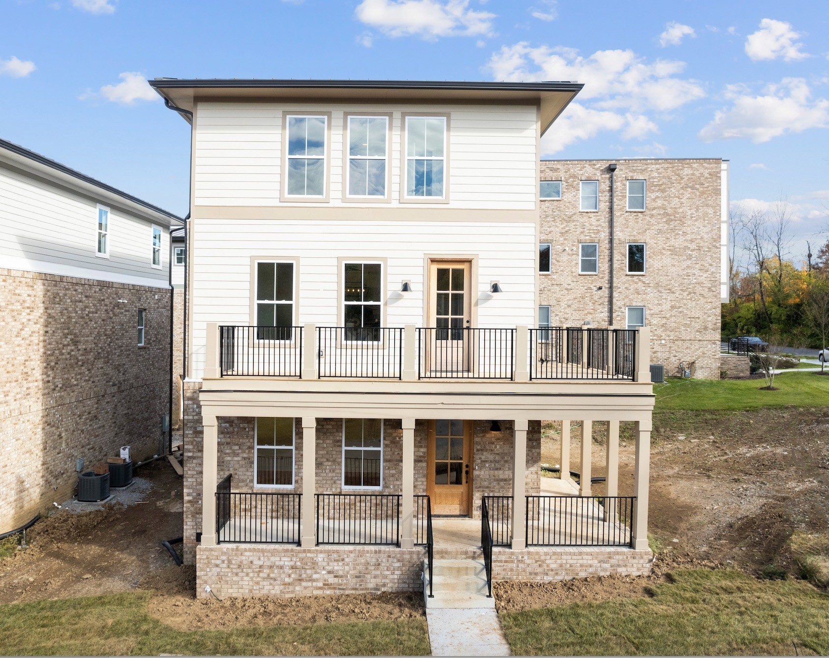 a large building with a window and balcony