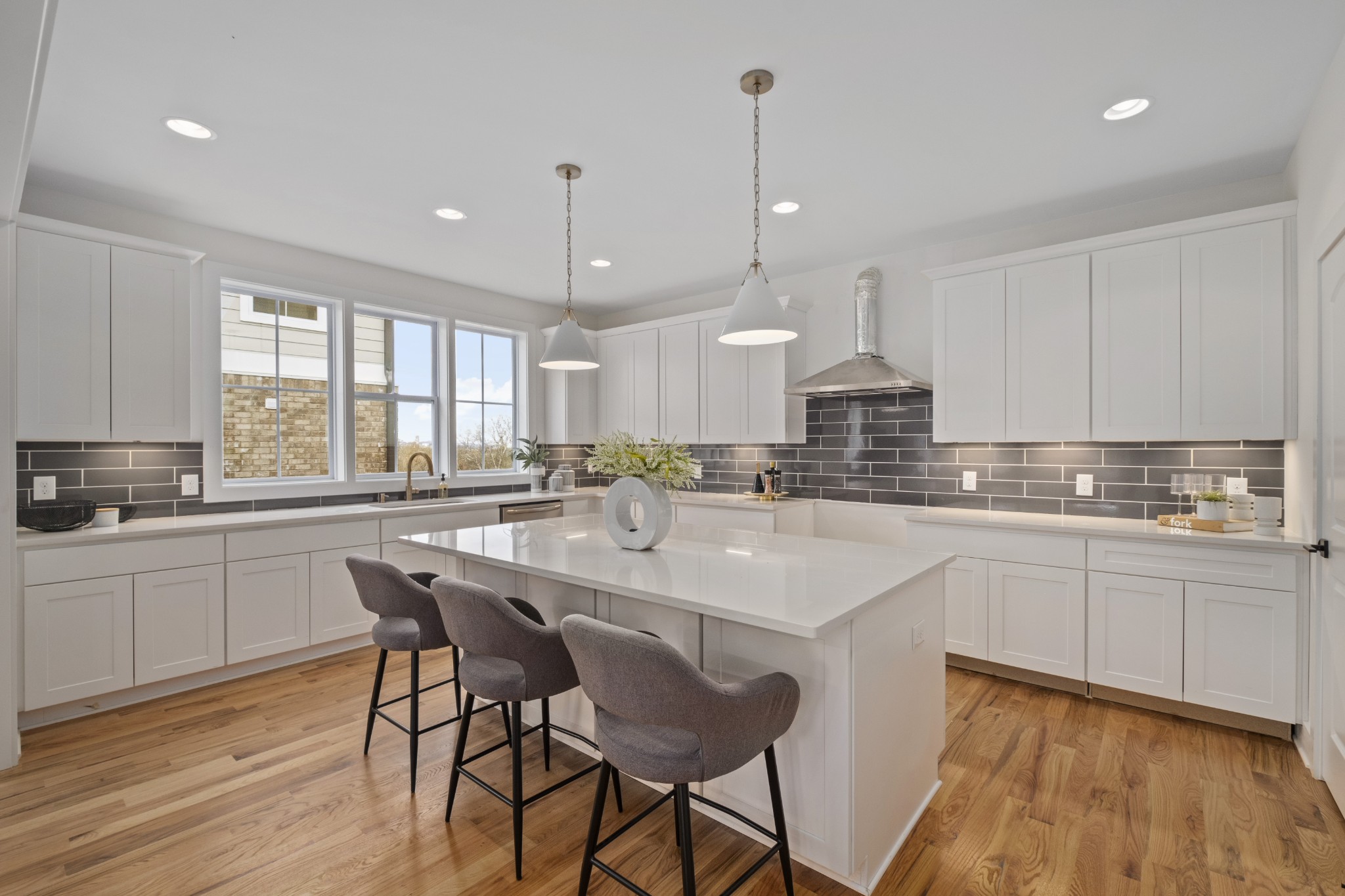 111 Demoss Road Nashville, TN 37209 - Photo 18 of 38 an open kitchen with granite countertop white cabinets and stainless steel appliances