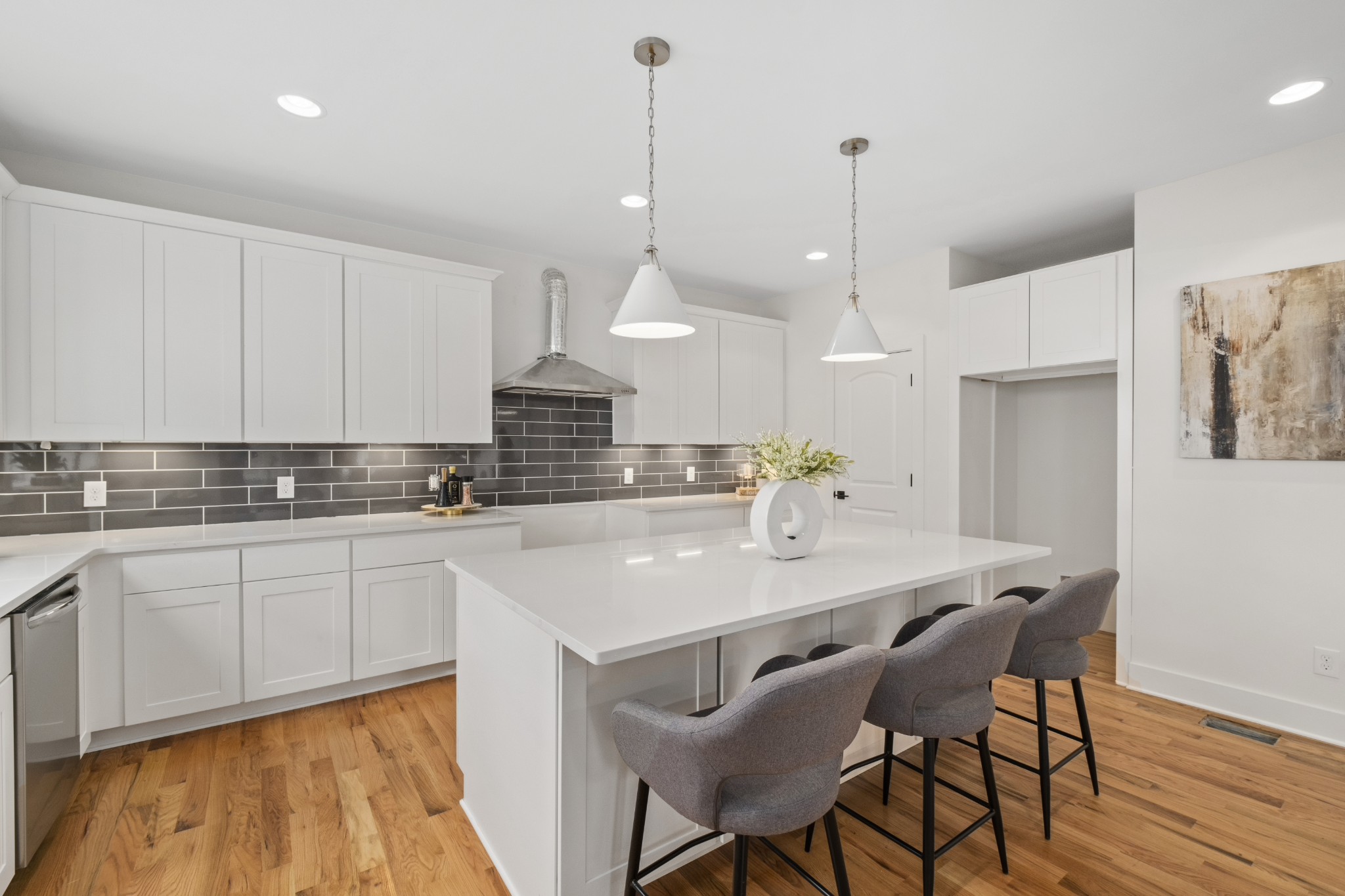 111 Demoss Road Nashville, TN 37209 - Photo 19 of 38 a kitchen with stainless steel appliances granite countertop a kitchen island a stove a table and chairs