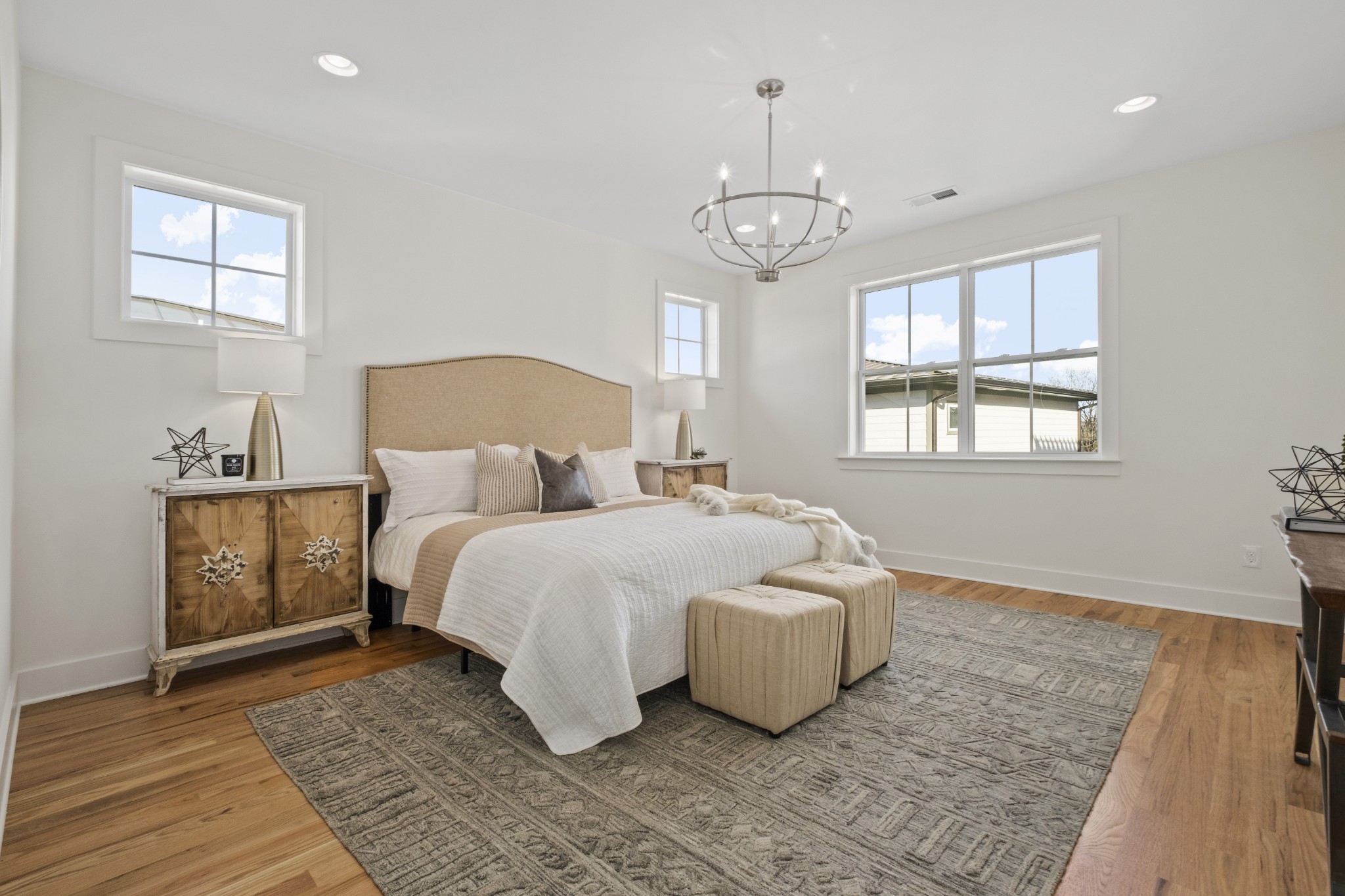 111 Demoss Road Nashville, TN 37209 - Photo 25 of 38 a spacious bedroom with a bed and wooden floor
