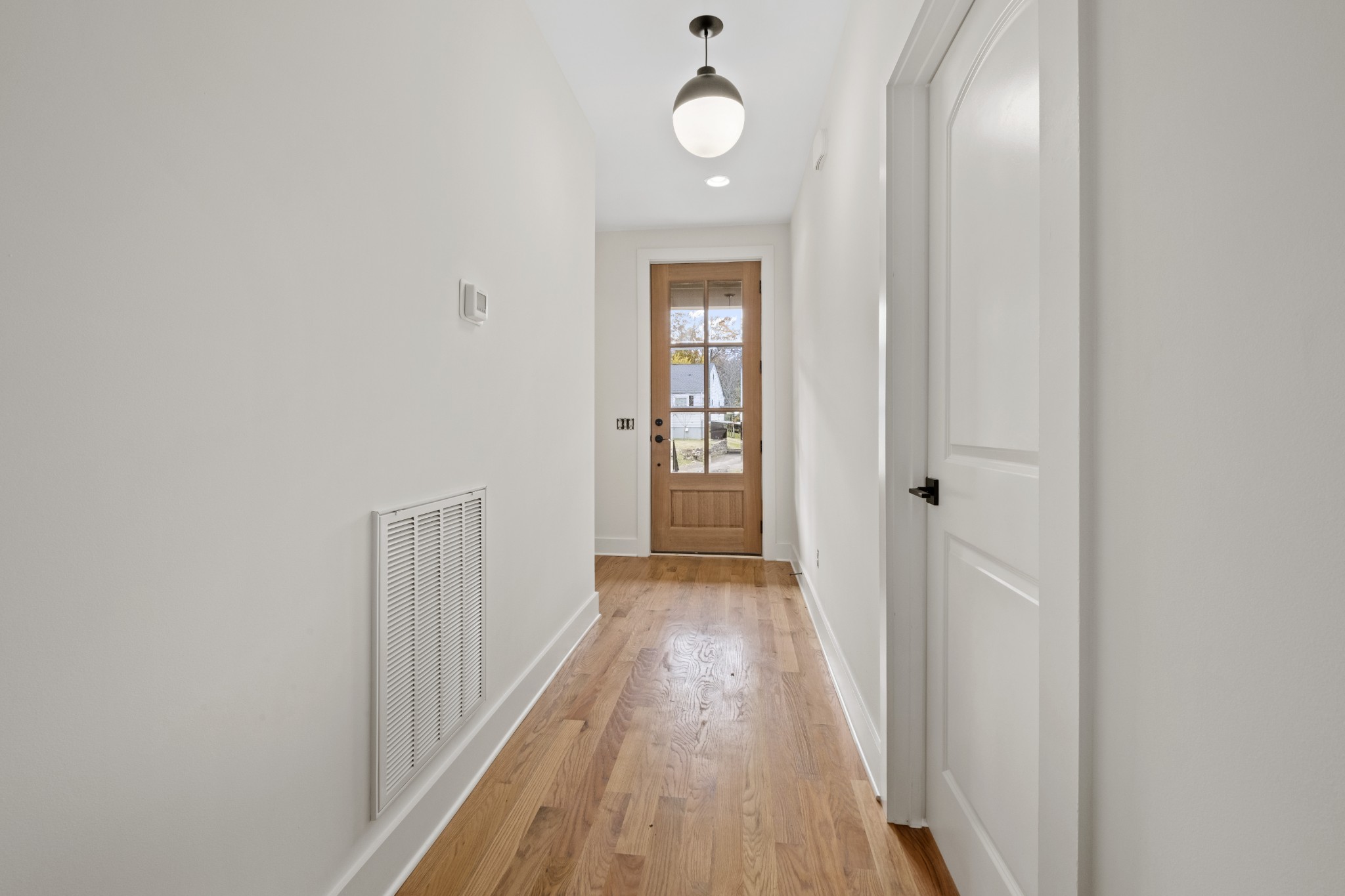 111 Demoss Road Nashville, TN 37209 - Photo 6 of 38 a view of a hallway with wooden floor