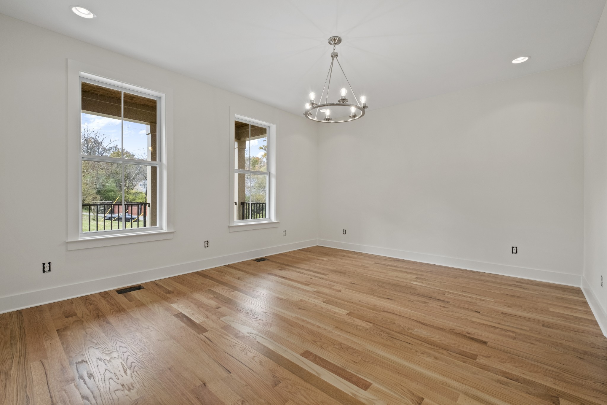 111 Demoss Road Nashville, TN 37209 - Photo 7 of 38 a view of empty room with wooden floor and fan