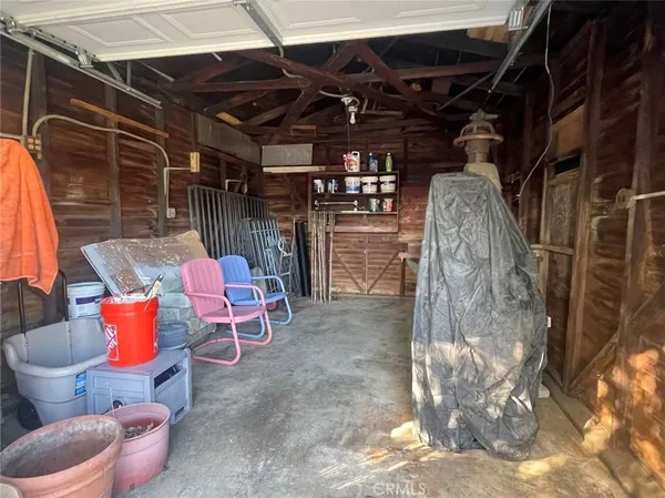 a view of a chairs and table in a patio