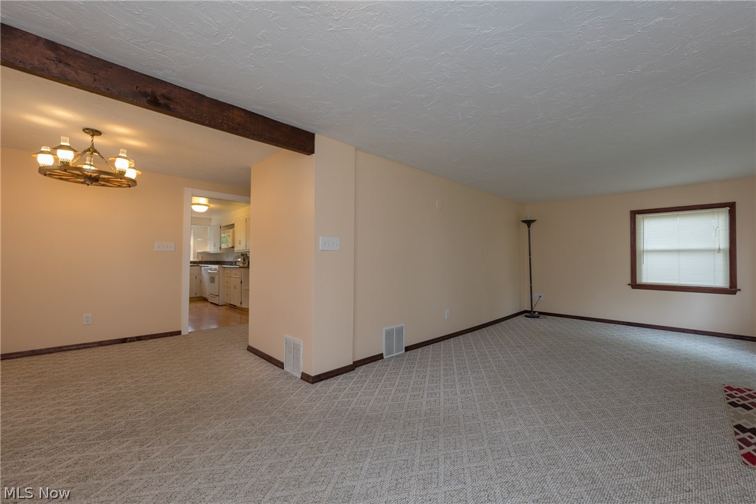 1453 Belrose Road Cleveland, OH 44124 - Photo 5 of 33 The open plan of the Living Room with dining area shown at left