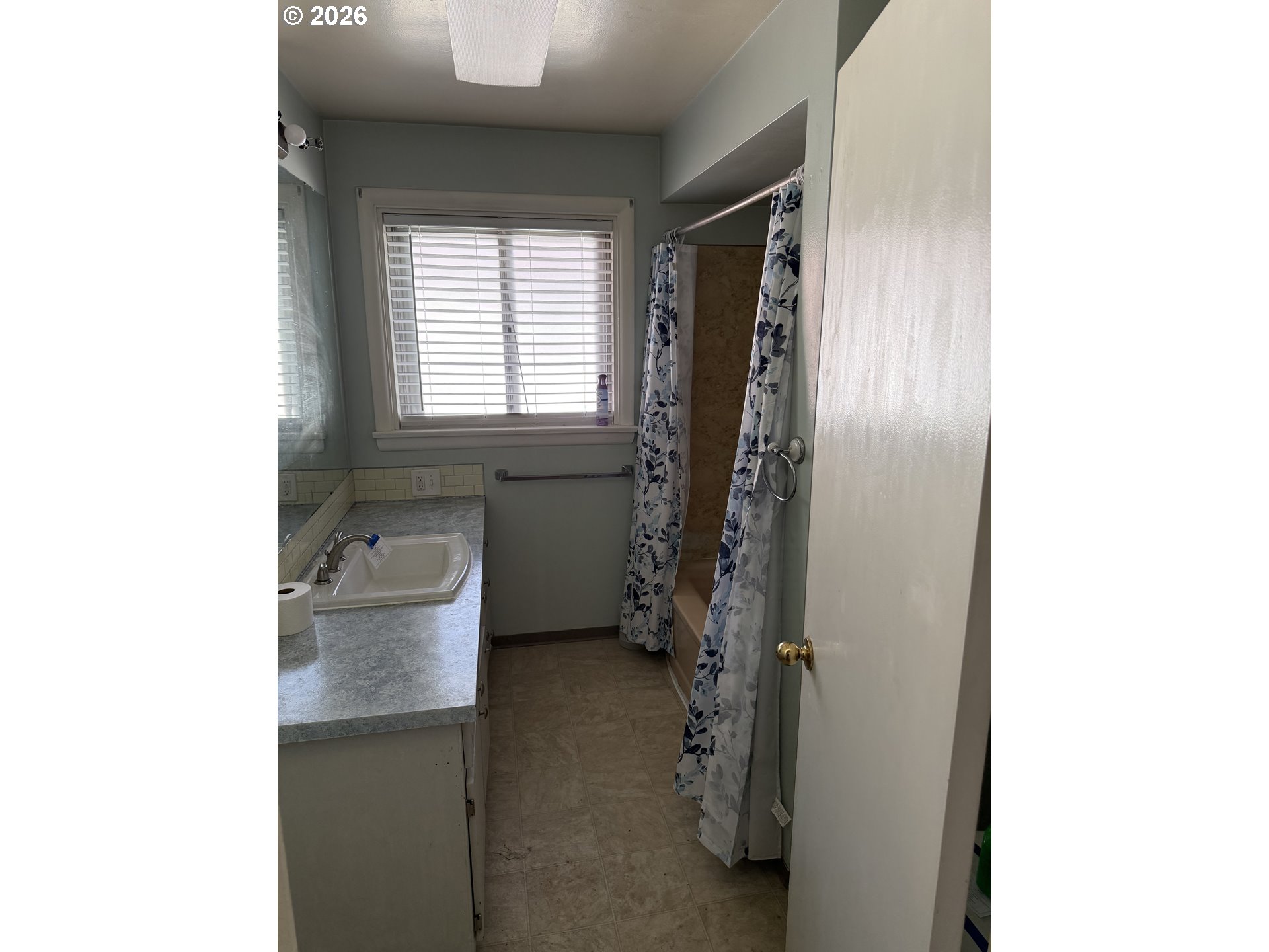 225 Southwest 7th Place Hermiston, OR 97838 - Photo 8 of 13 a bathroom with a sink and a mirror