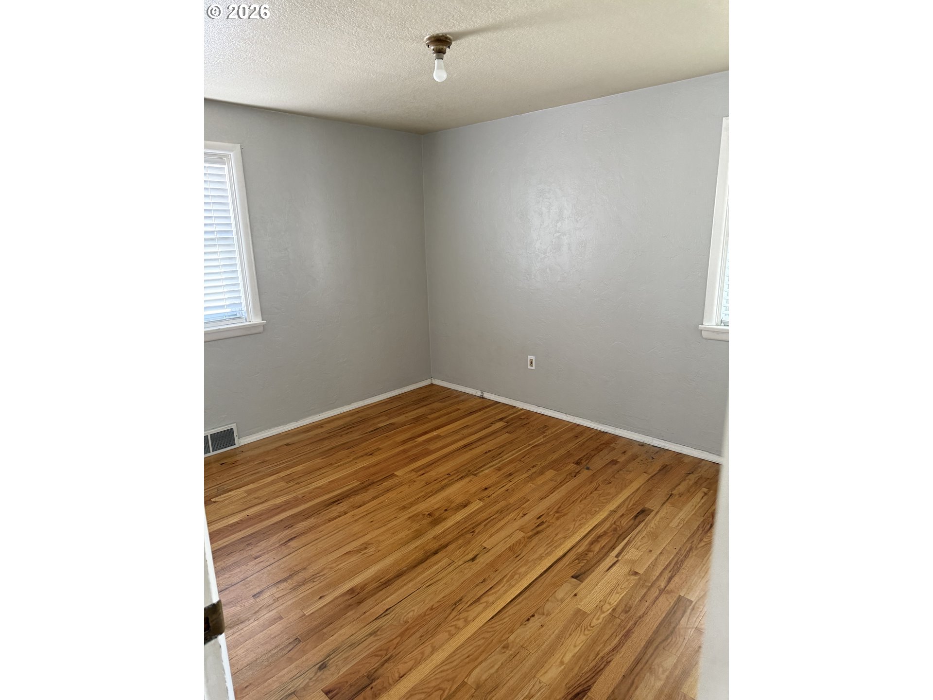 225 Southwest 7th Place Hermiston, OR 97838 - Photo 9 of 13 a view of wooden floor in a room