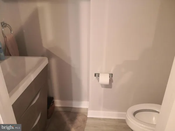 a bathroom with a sink and toilet