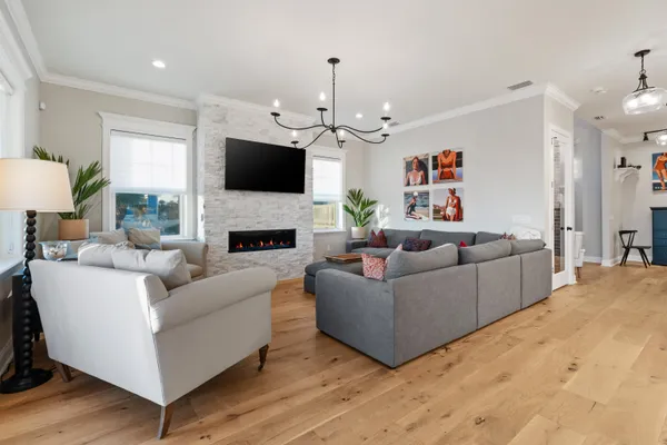 a spacious bathroom with a double vanity sink a mirror and a bathtub