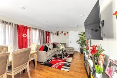 a living room filled with furniture and a couch