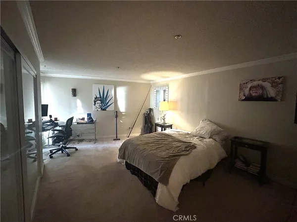 a view of a hallway with a chair
