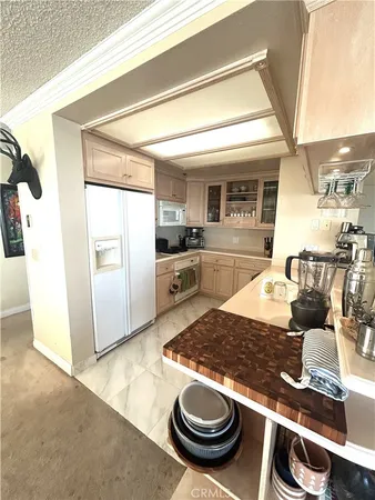 a room with furniture a lamp and a window