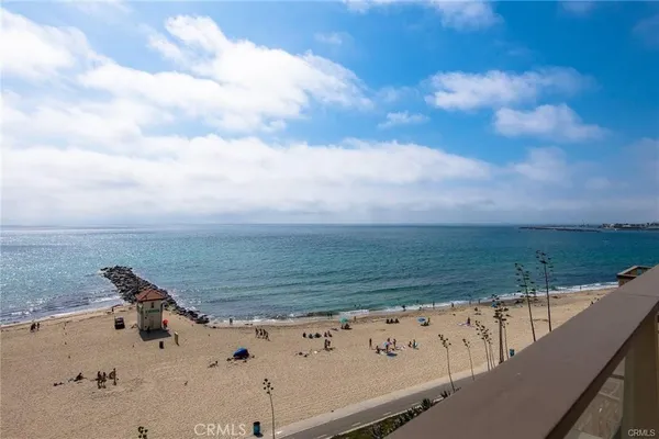 a living room with a couch and dresser