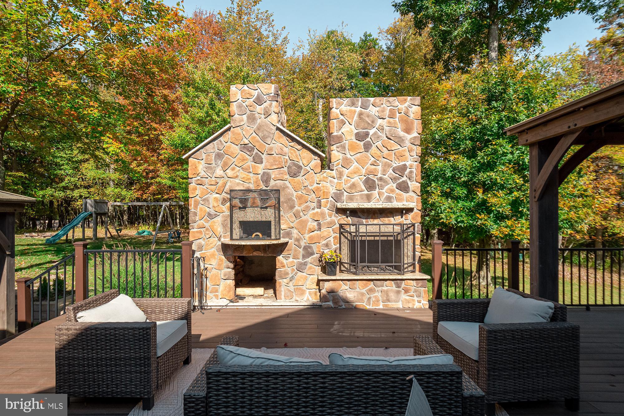 1865 Paradise Point Road Oakland, MD 21550 - Photo 11 of 76 Outside fireplace and Pizza oven