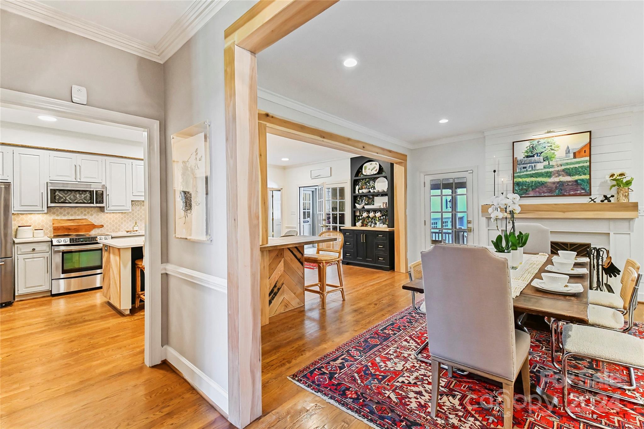 3023 High Ridge Road Charlotte, NC 28270 - Photo 11 of 48 a view of a dining room with furniture window and wooden floor