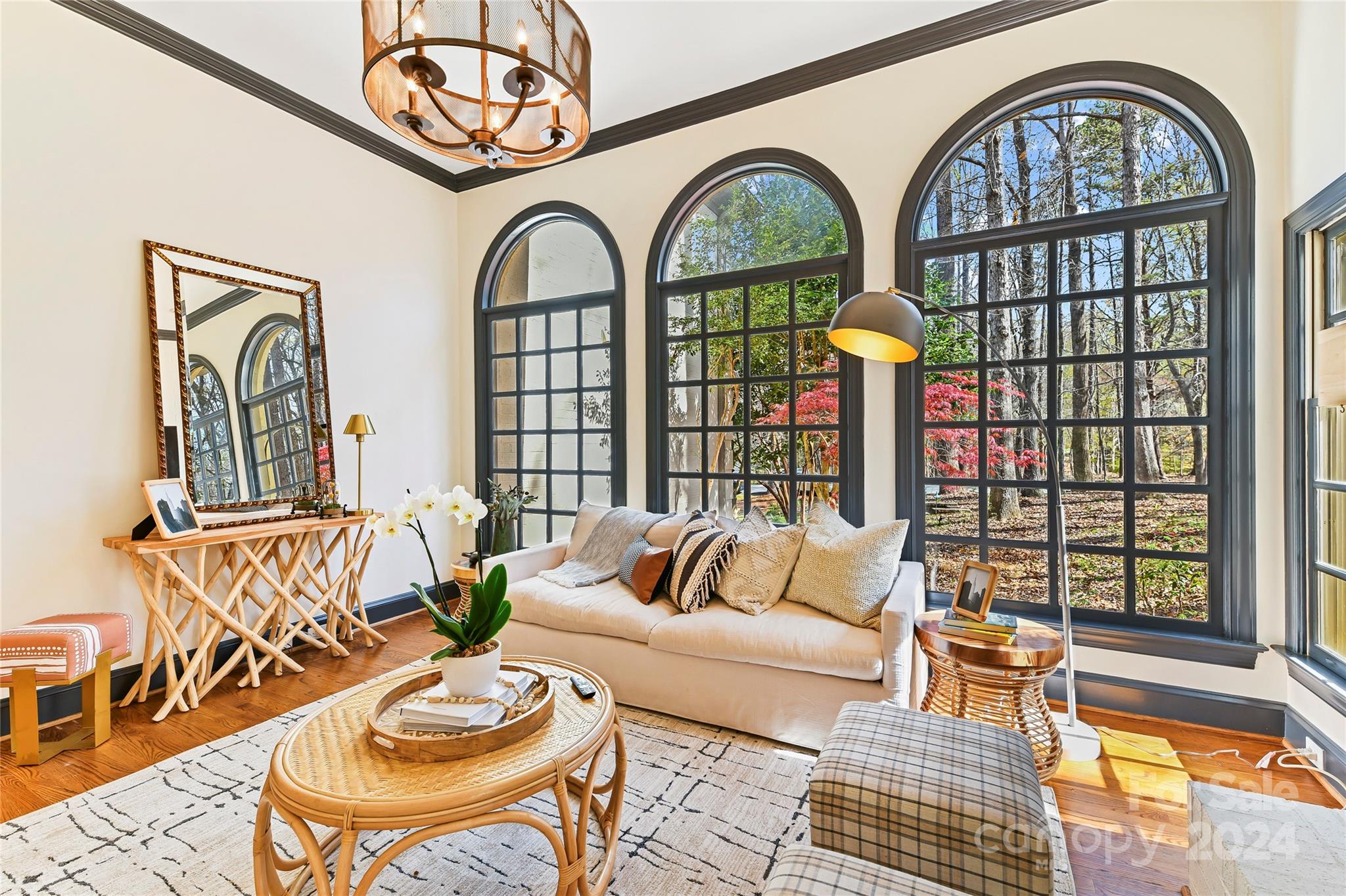 3023 High Ridge Road Charlotte, NC 28270 - Photo 15 of 48 a living room with large couches a dining table and chairs with outer view