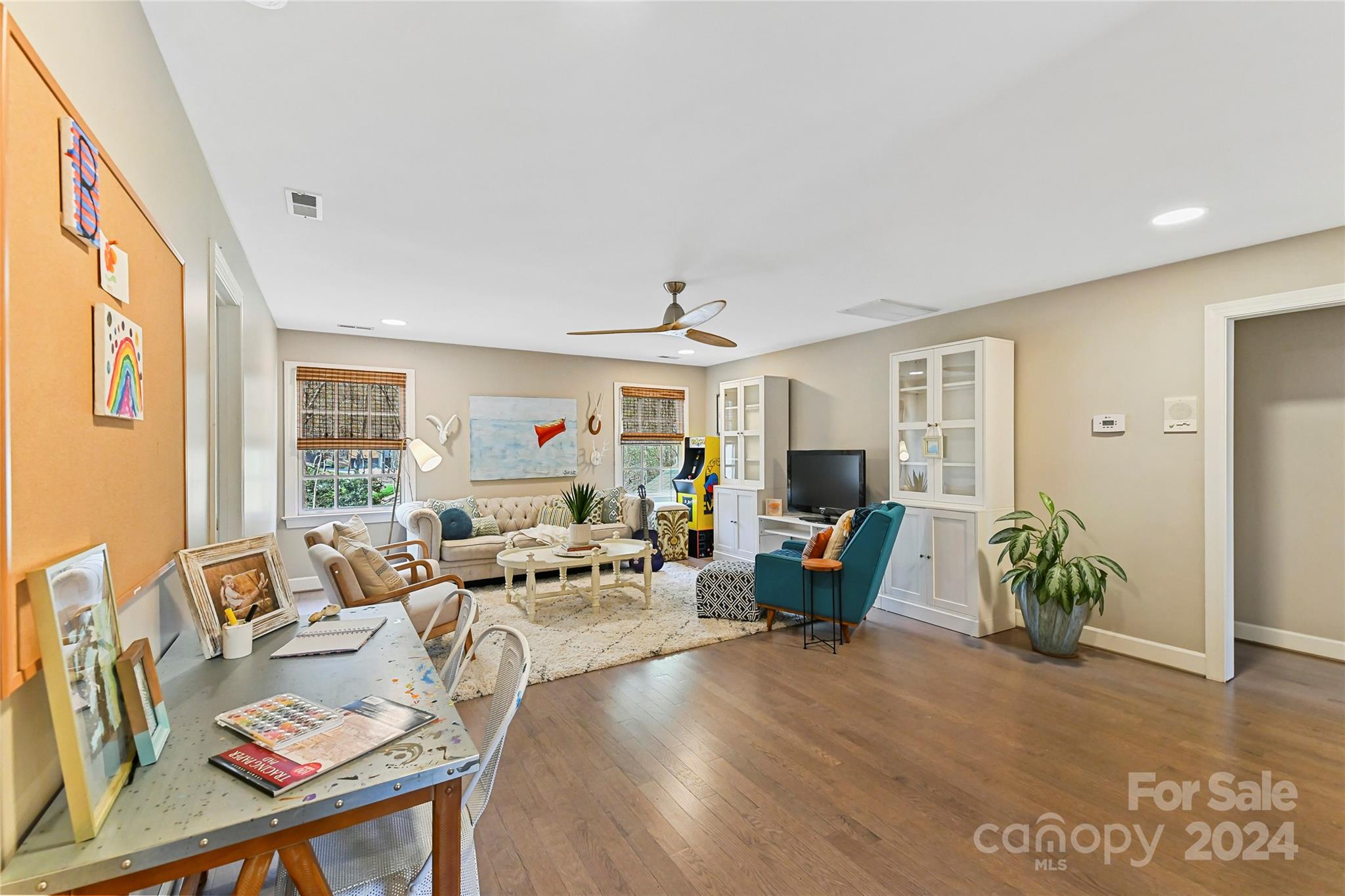 3023 High Ridge Road Charlotte, NC 28270 - Photo 27 of 48 a living room with furniture and a wooden floor