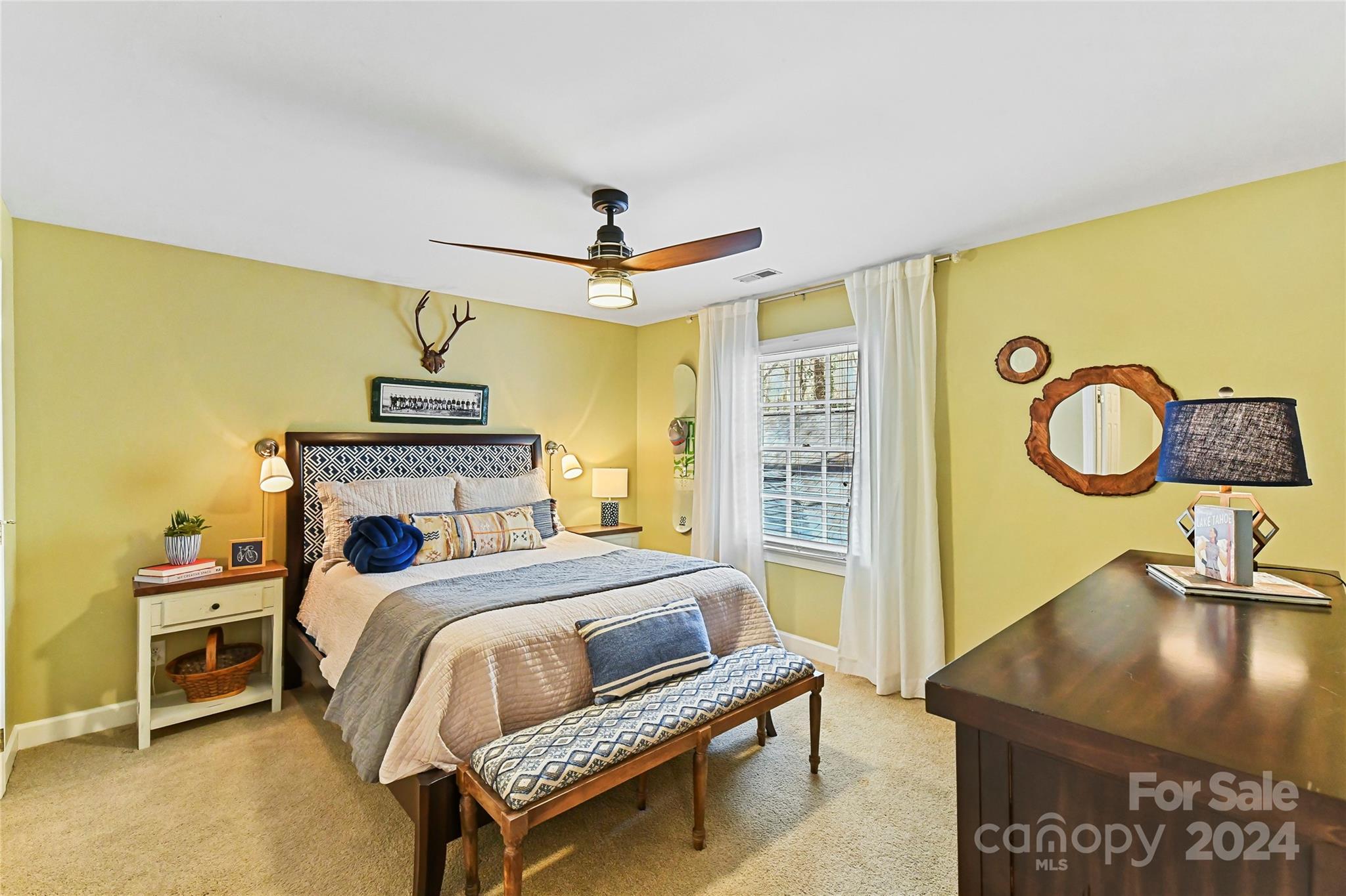 3023 High Ridge Road Charlotte, NC 28270 - Photo 30 of 48 a bedroom with a bed and a dresser with the shoe rack