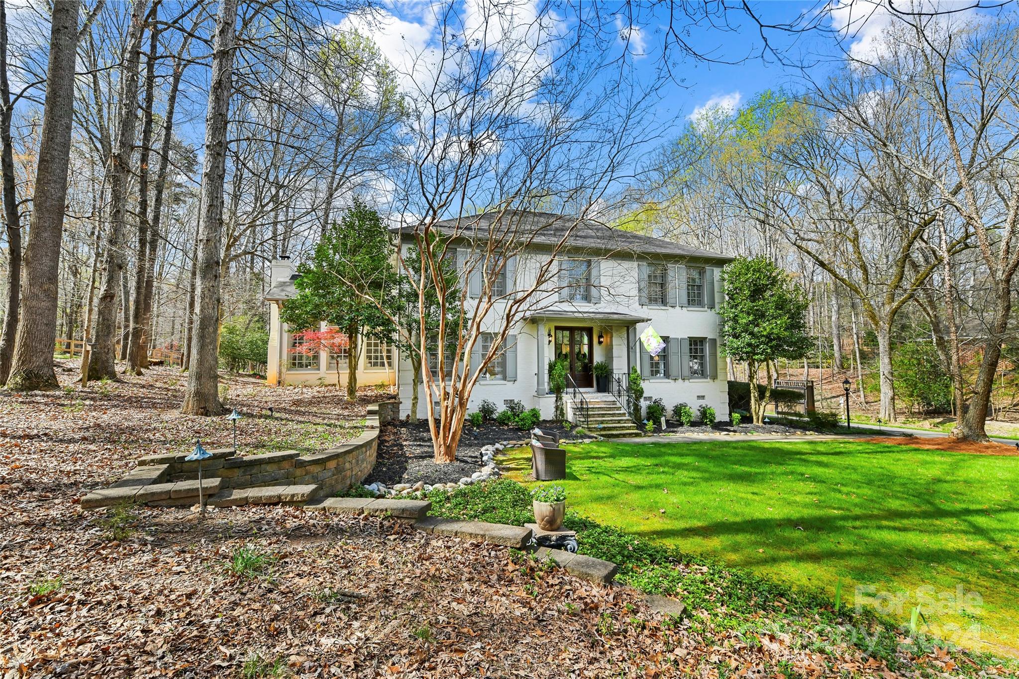 3023 High Ridge Road Charlotte, NC 28270 - Photo 3 of 48 a view of a house with a yard