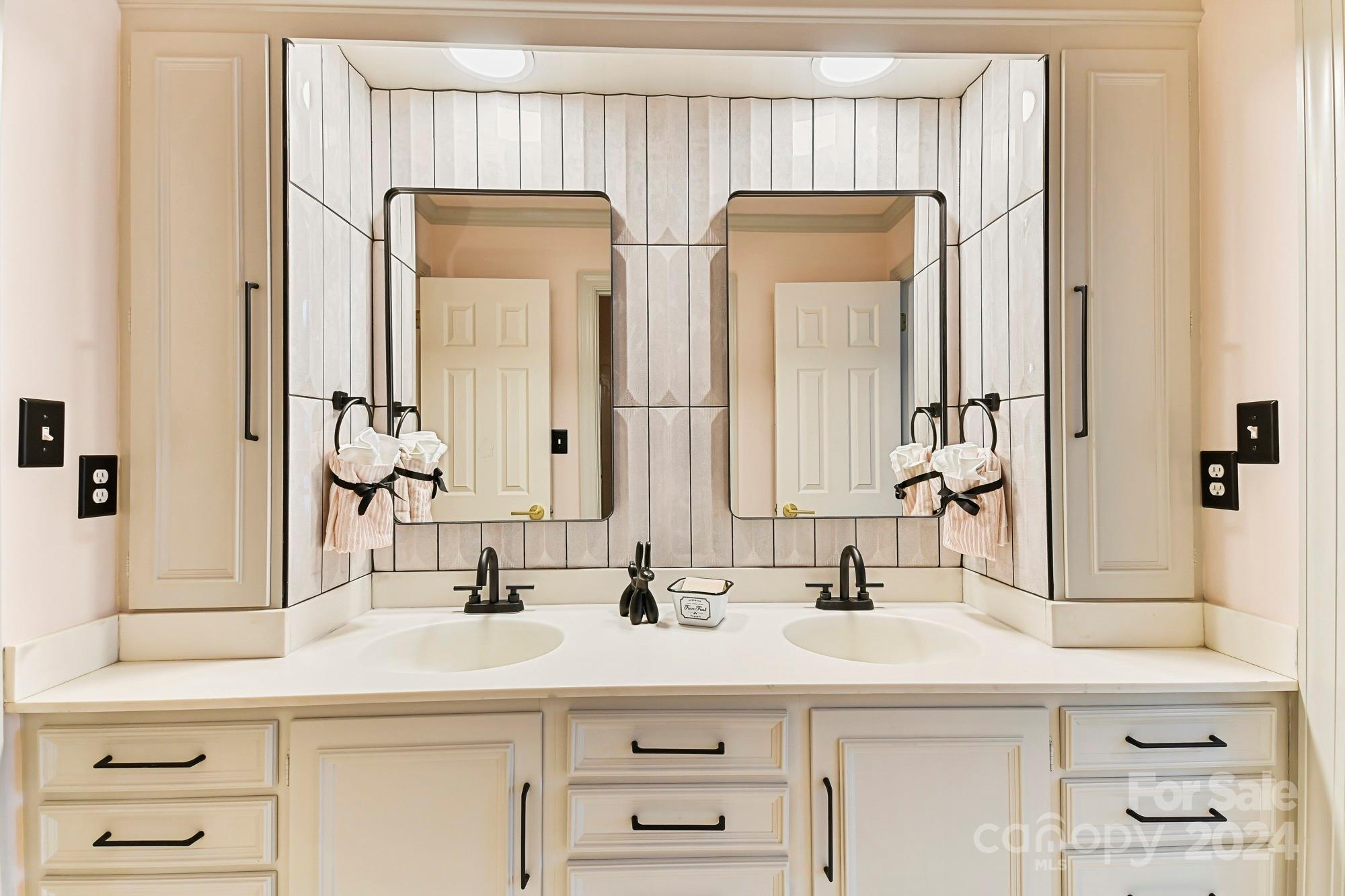 3023 High Ridge Road Charlotte, NC 28270 - Photo 36 of 48 a bathroom with double vanity sink and a mirror