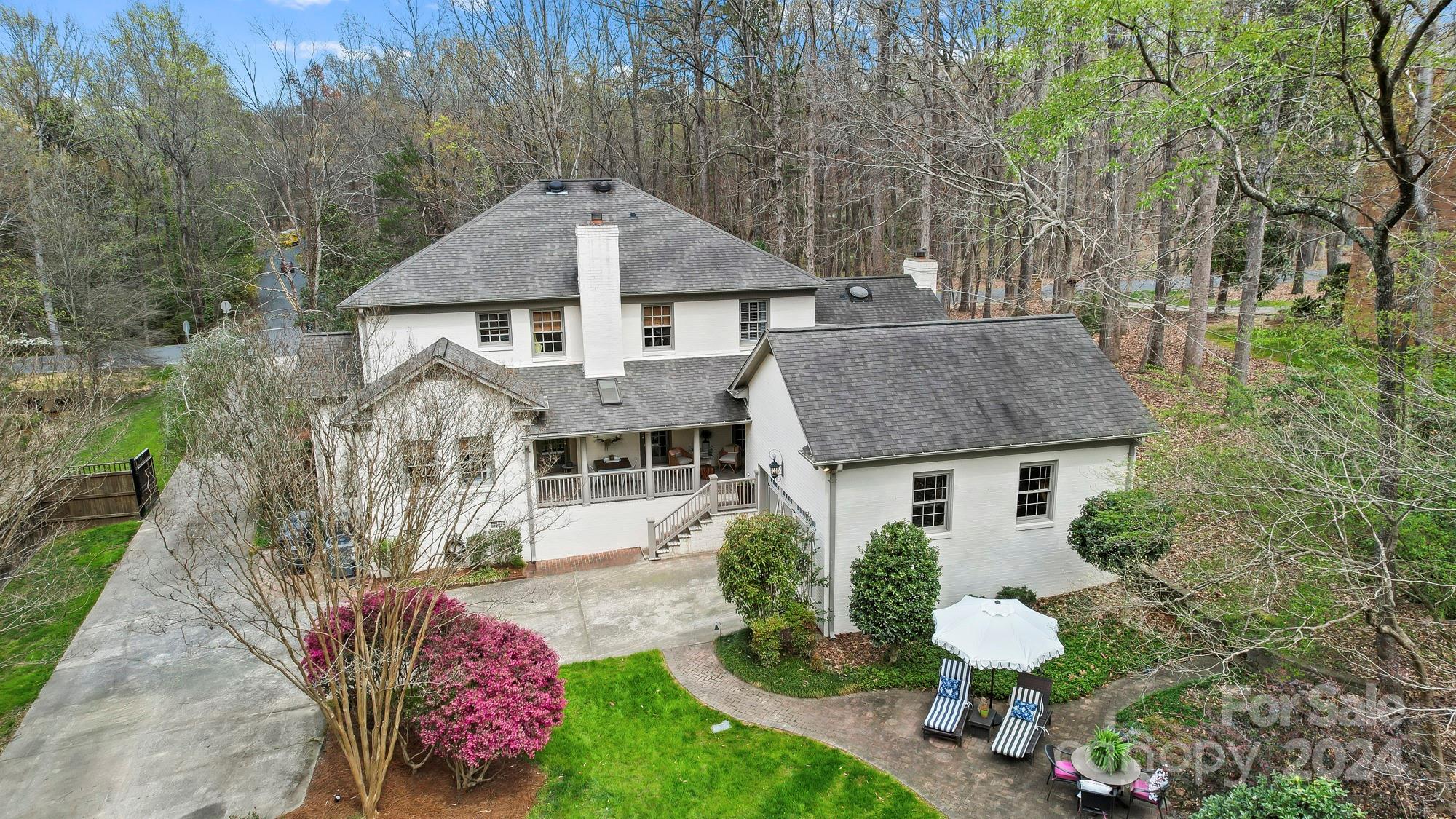 3023 High Ridge Road Charlotte, NC 28270 - Photo 43 of 48 a front view of a house with garden