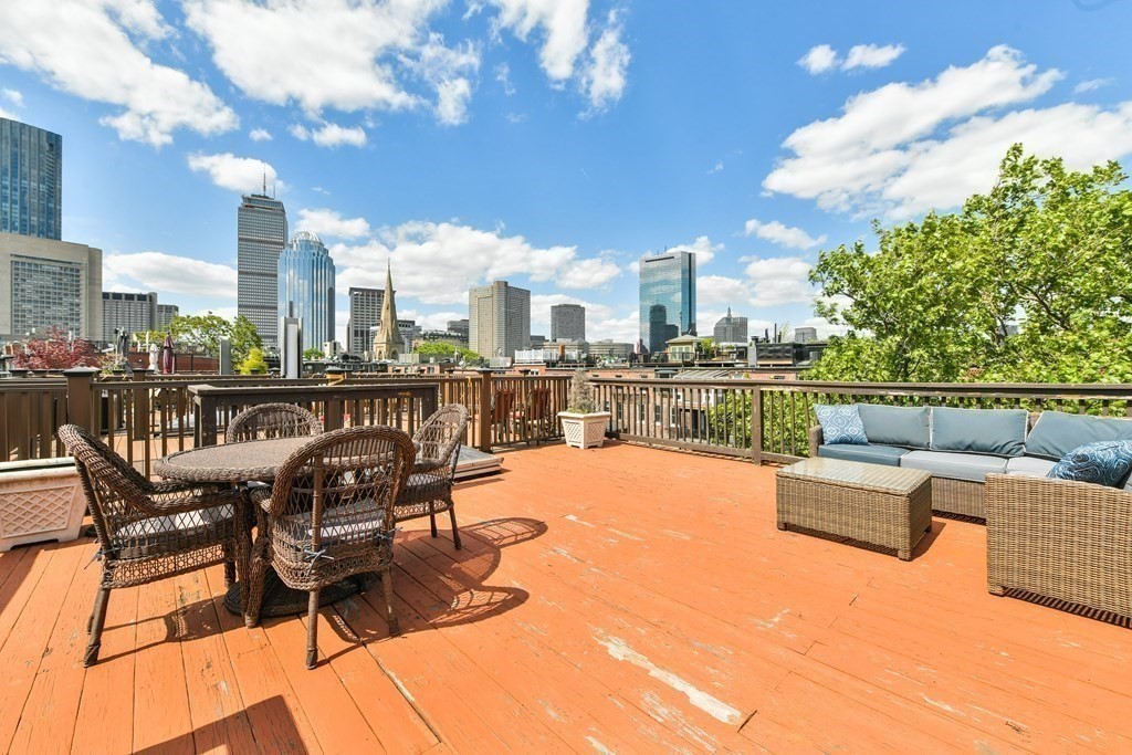 a view of a terrace with furniture