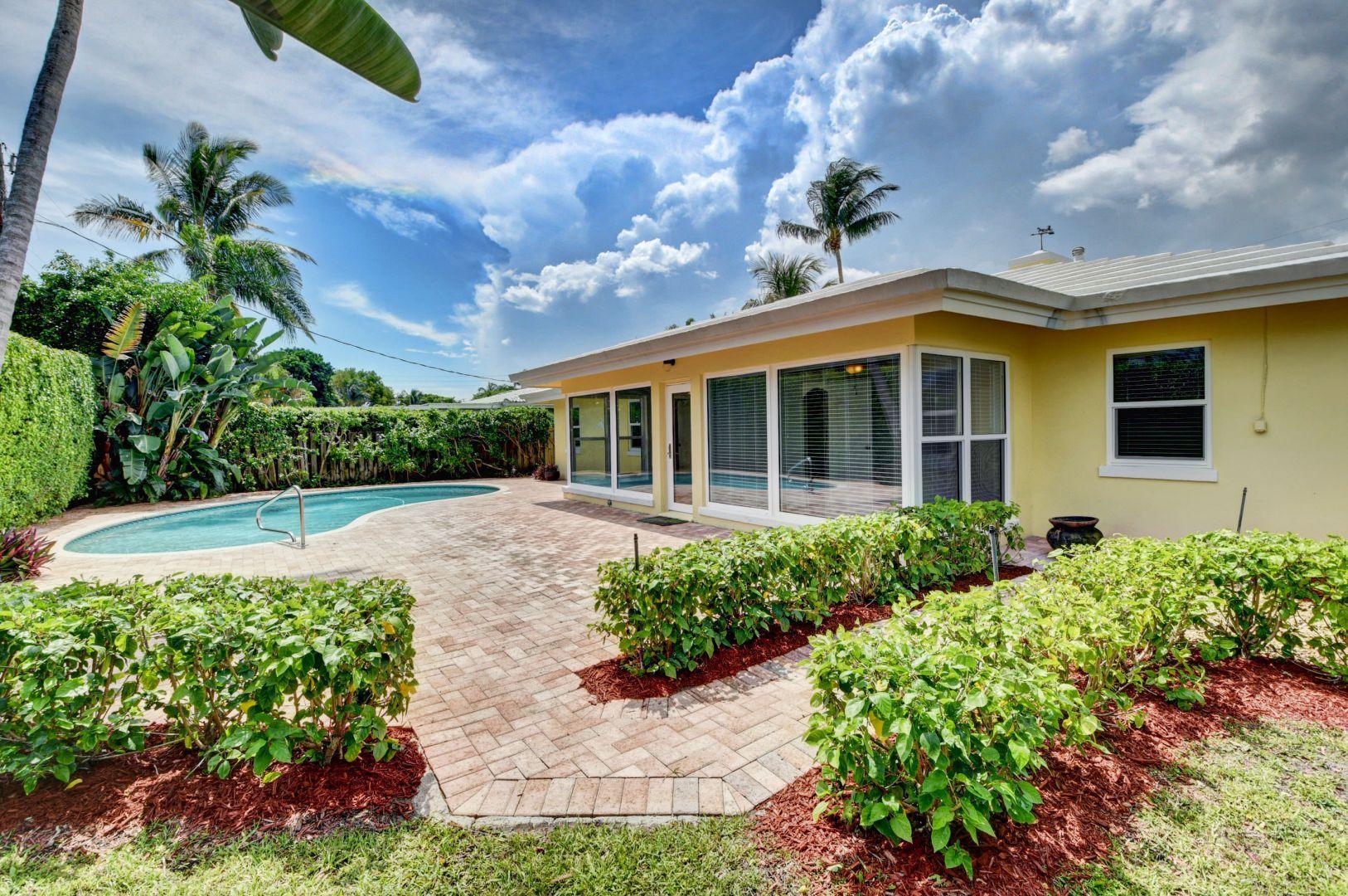 470 Northeast Spanish Trail Boca Raton, FL 33432 - Photo 39 of 42 REAR EXTERIOR