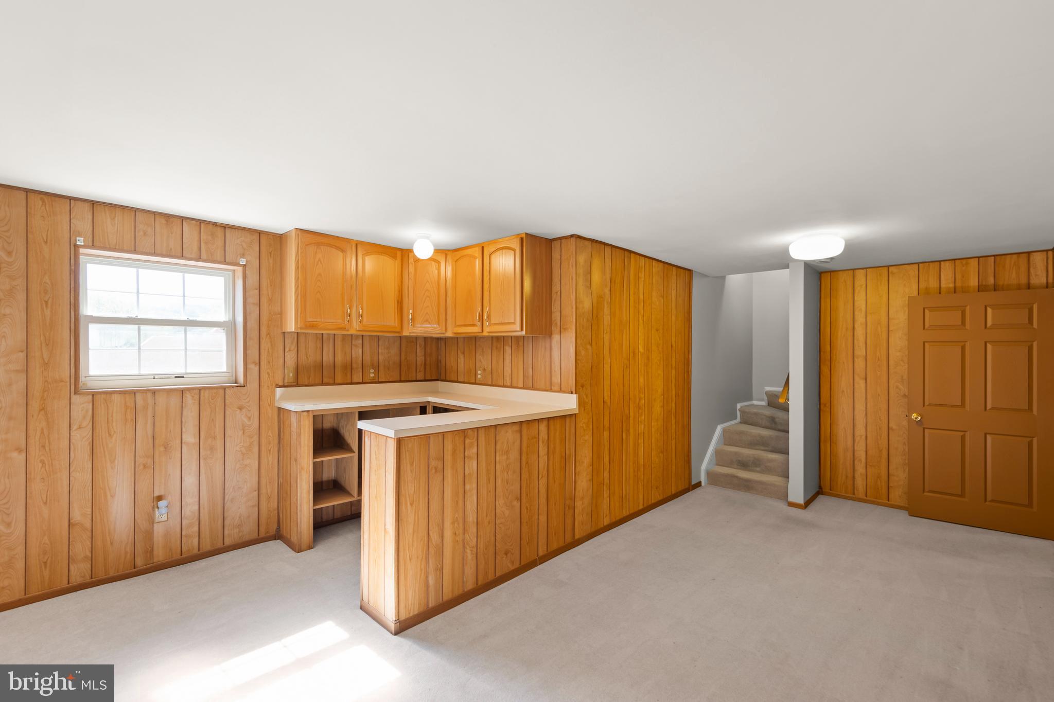 1039 Hiatt Road Clear Brook, VA 22624 - Photo 40 of 55 an empty room with a kitchen