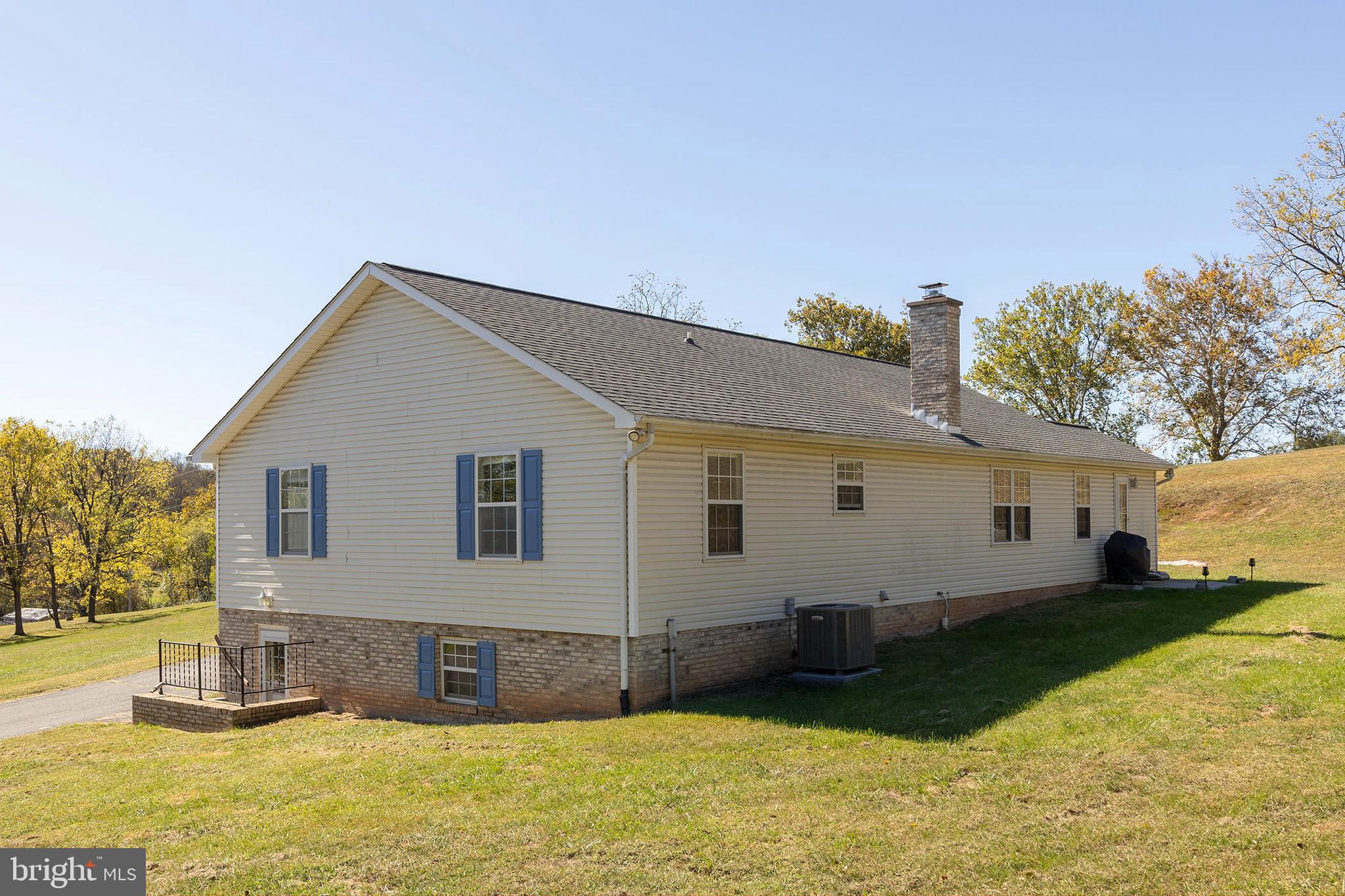 1039 Hiatt Road Clear Brook, VA 22624 - Photo 46 of 55 a view of a house with a yard