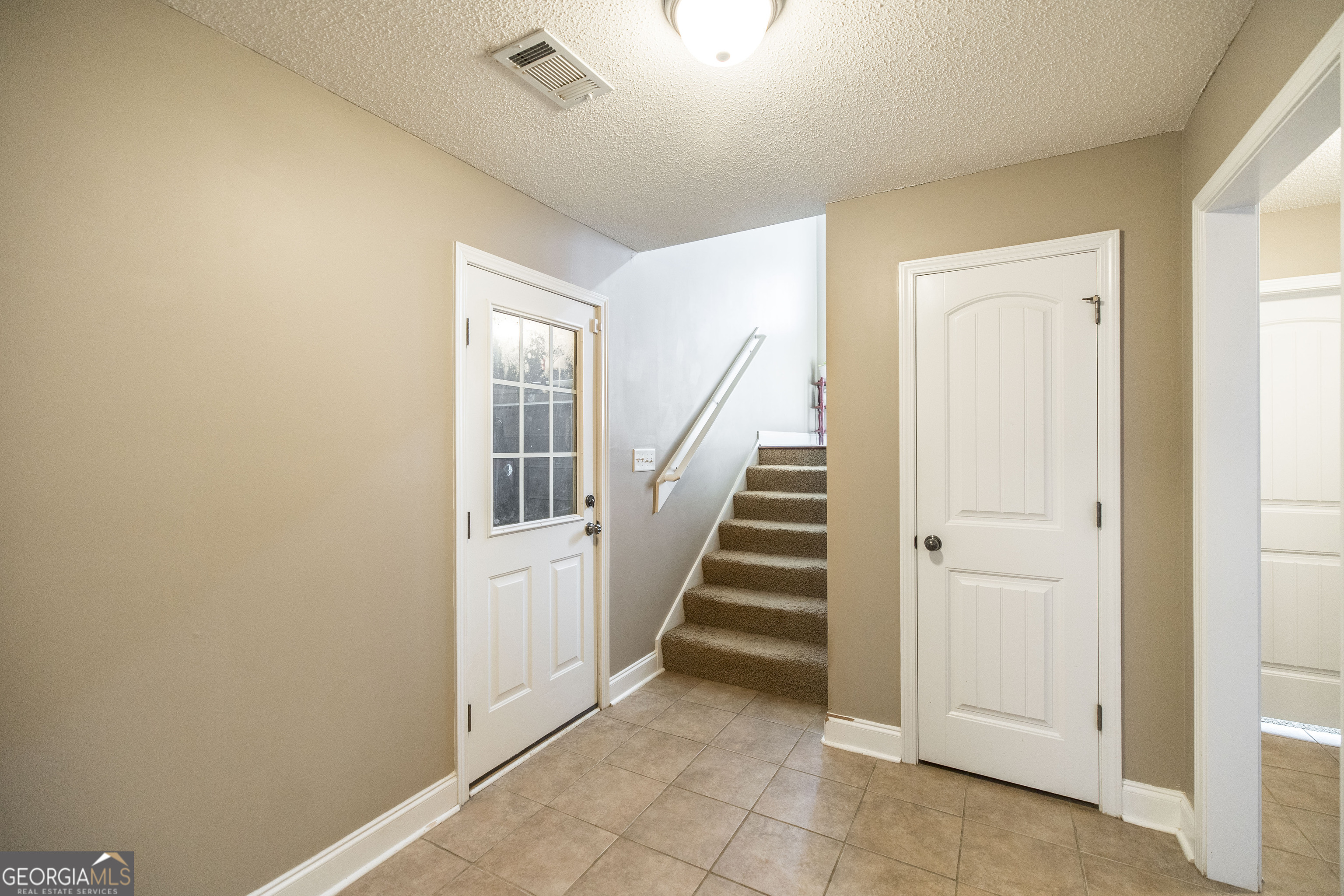 303 Rose Pointe Court Bonaire, GA 31005 - Photo 21 of 31 a view of entryway with stairs