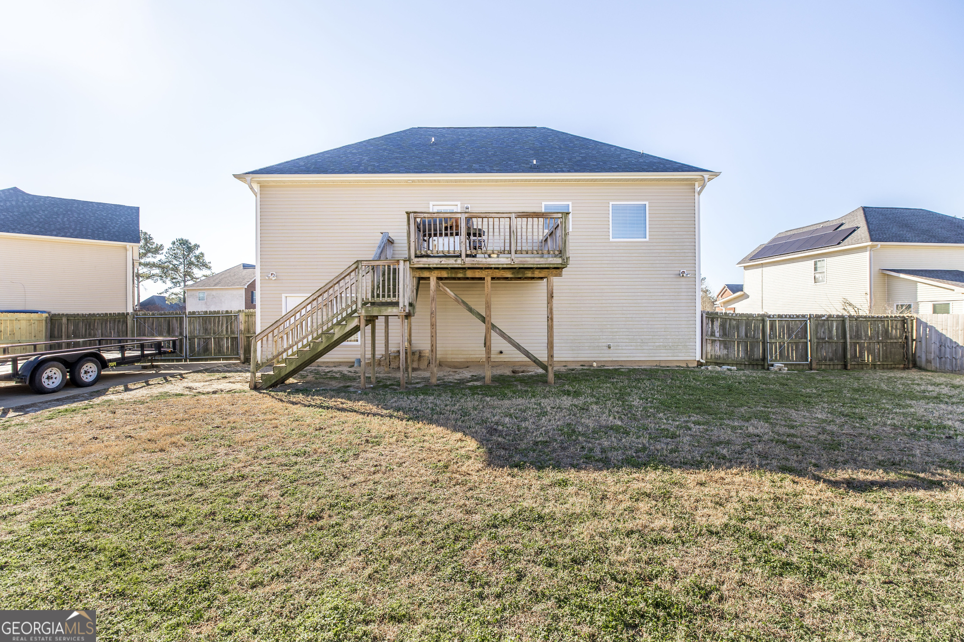 303 Rose Pointe Court Bonaire, GA 31005 - Photo 29 of 31 a house with trees in front of it