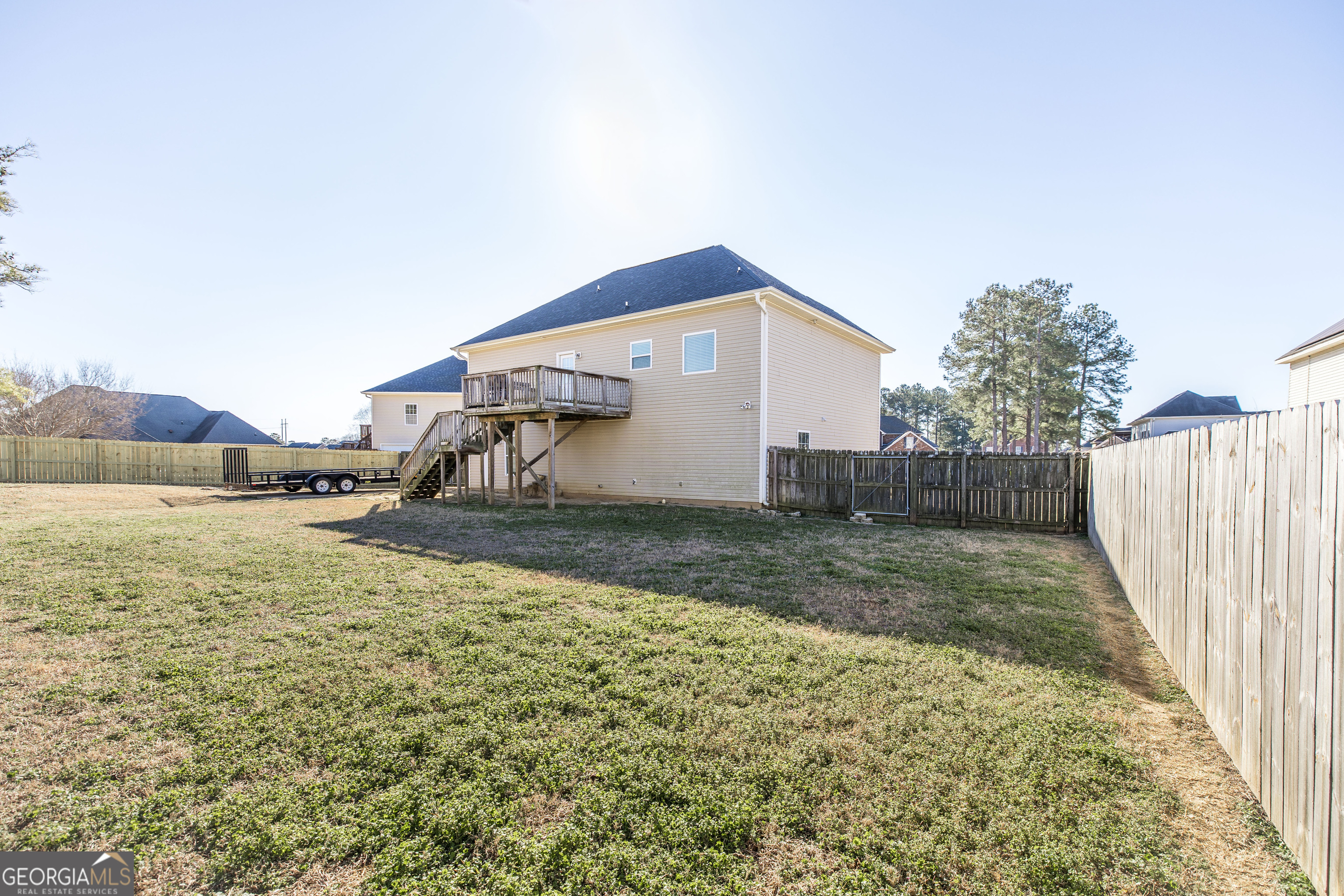 303 Rose Pointe Court Bonaire, GA 31005 - Photo 30 of 31 a view of a house with backyard