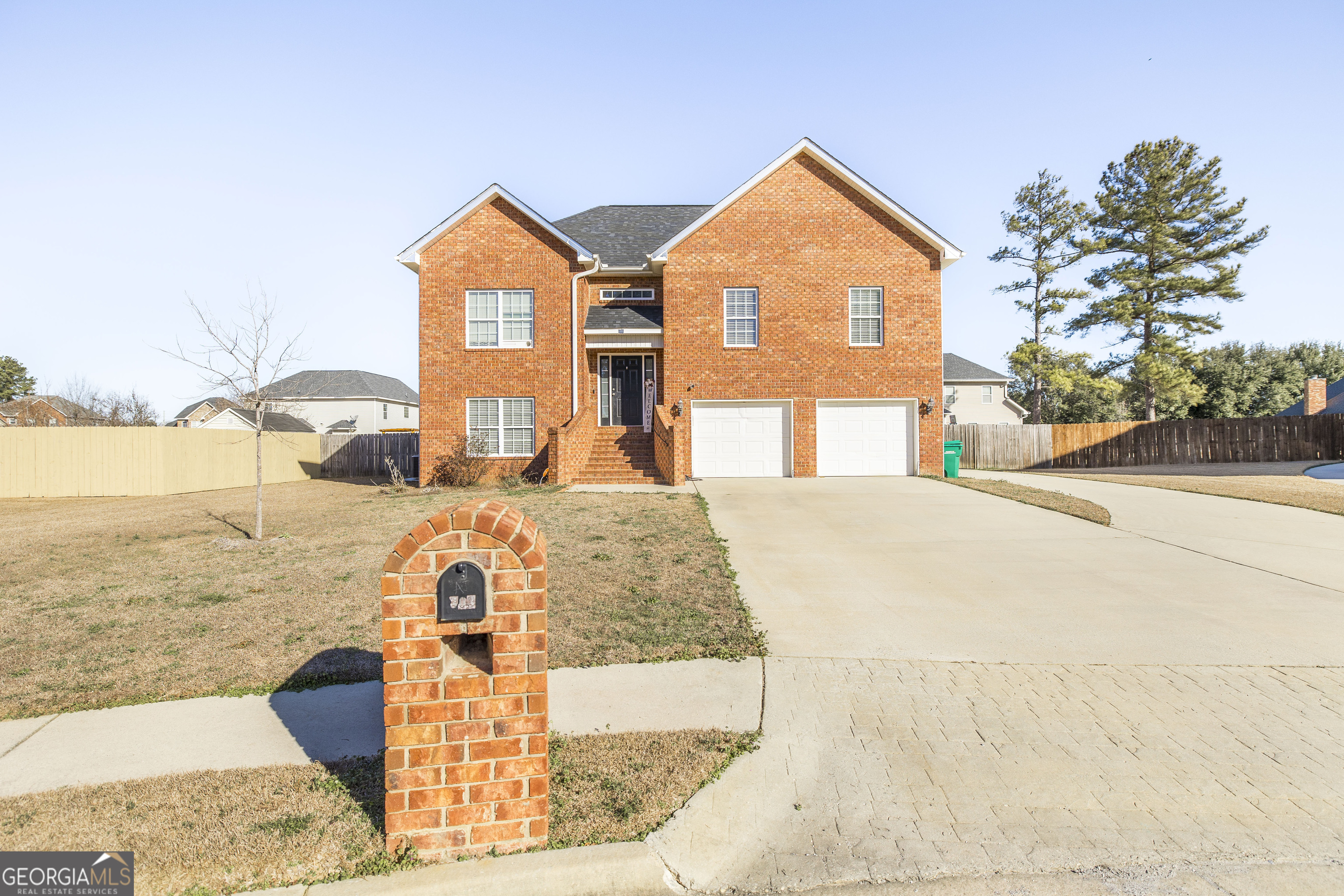 303 Rose Pointe Court Bonaire, GA 31005 - Photo 3 of 31 a front view of a house with a yard