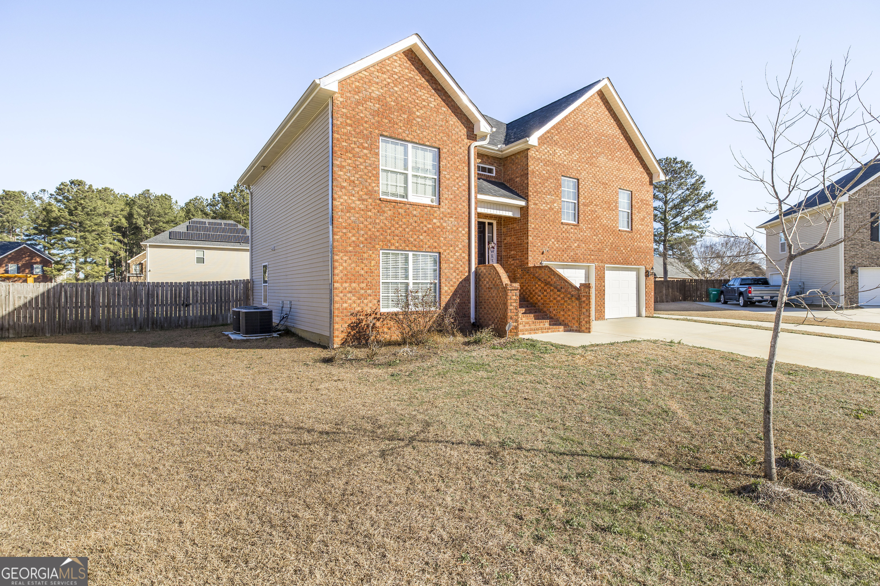 303 Rose Pointe Court Bonaire, GA 31005 - Photo 4 of 31 a view of a house with a backyard