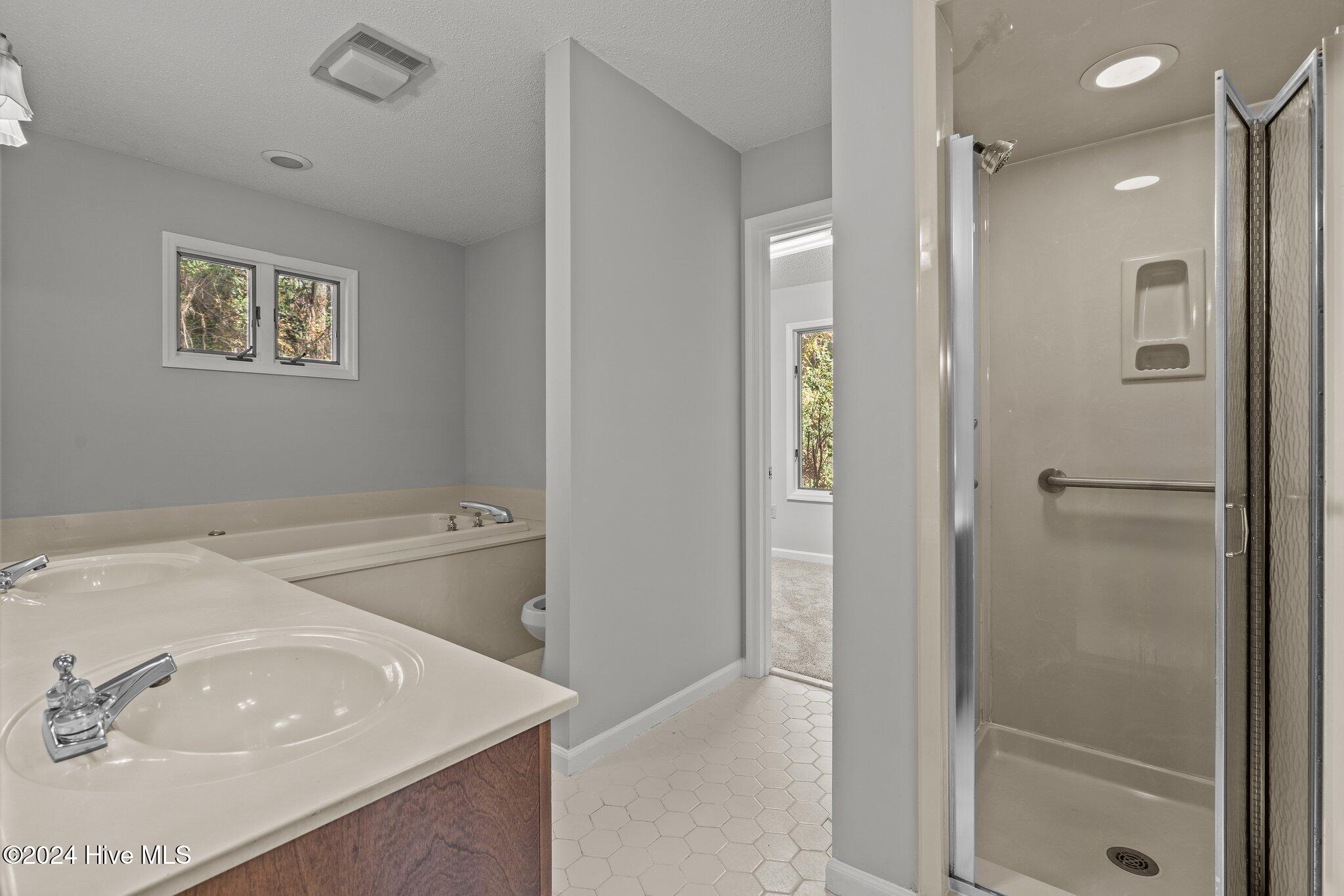560 South Bethesda Road Southern Pines, NC 28387 - Photo 25 of 53 Primary bathroom entrance.
