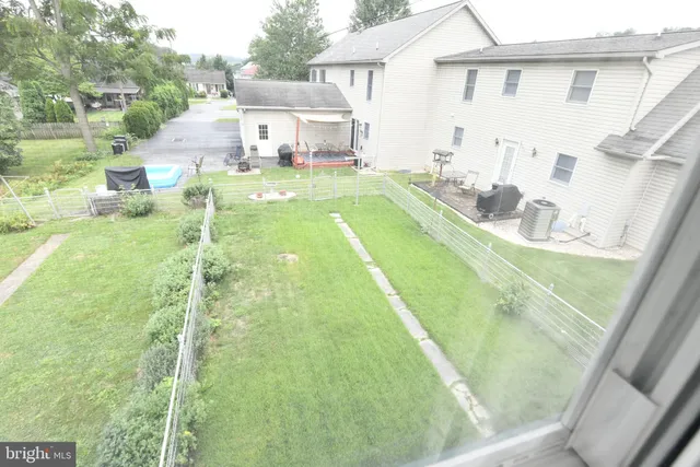 a house view with a outdoor space