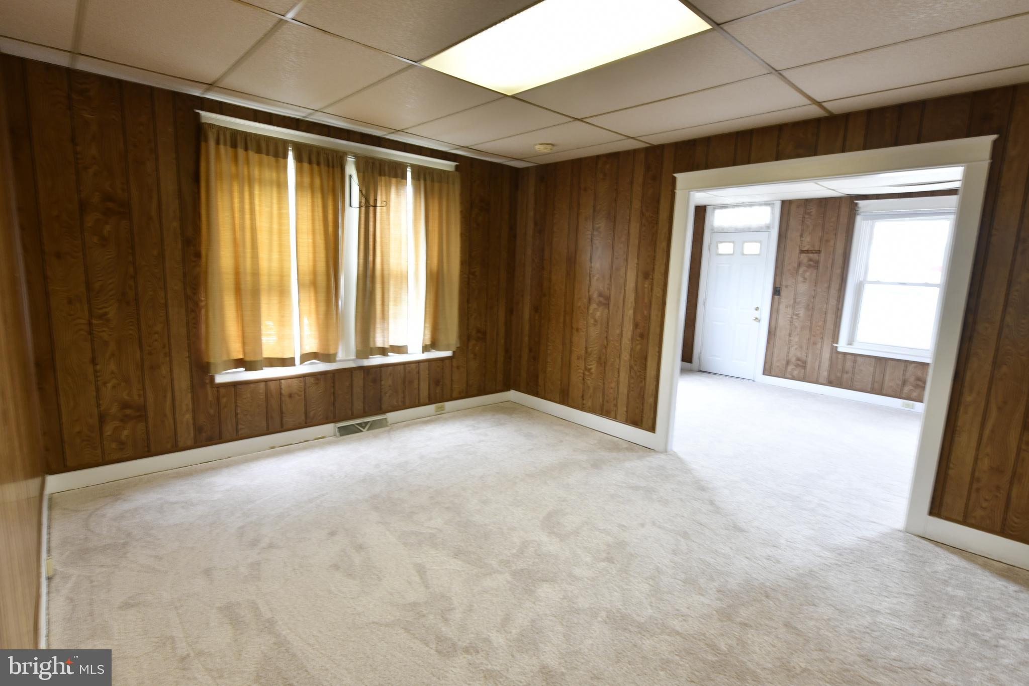 188 North Main Street Manheim, PA 17545 - Photo 3 of 19 a view of an empty room with a window