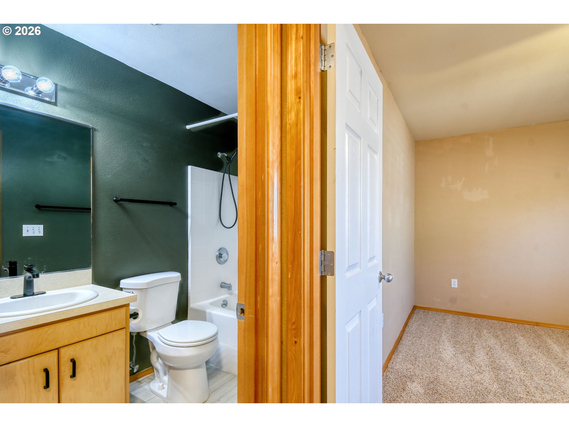 1614 Southwest 3rd Street Pendleton, OR 97801 - Photo 24 of 40 a bathroom with a granite countertop sink toilet and shower
