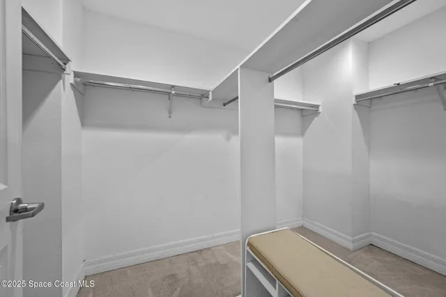 a bathroom with a bathtub sink and mirror