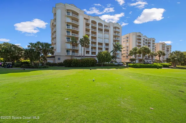 a view of a city with an ocean