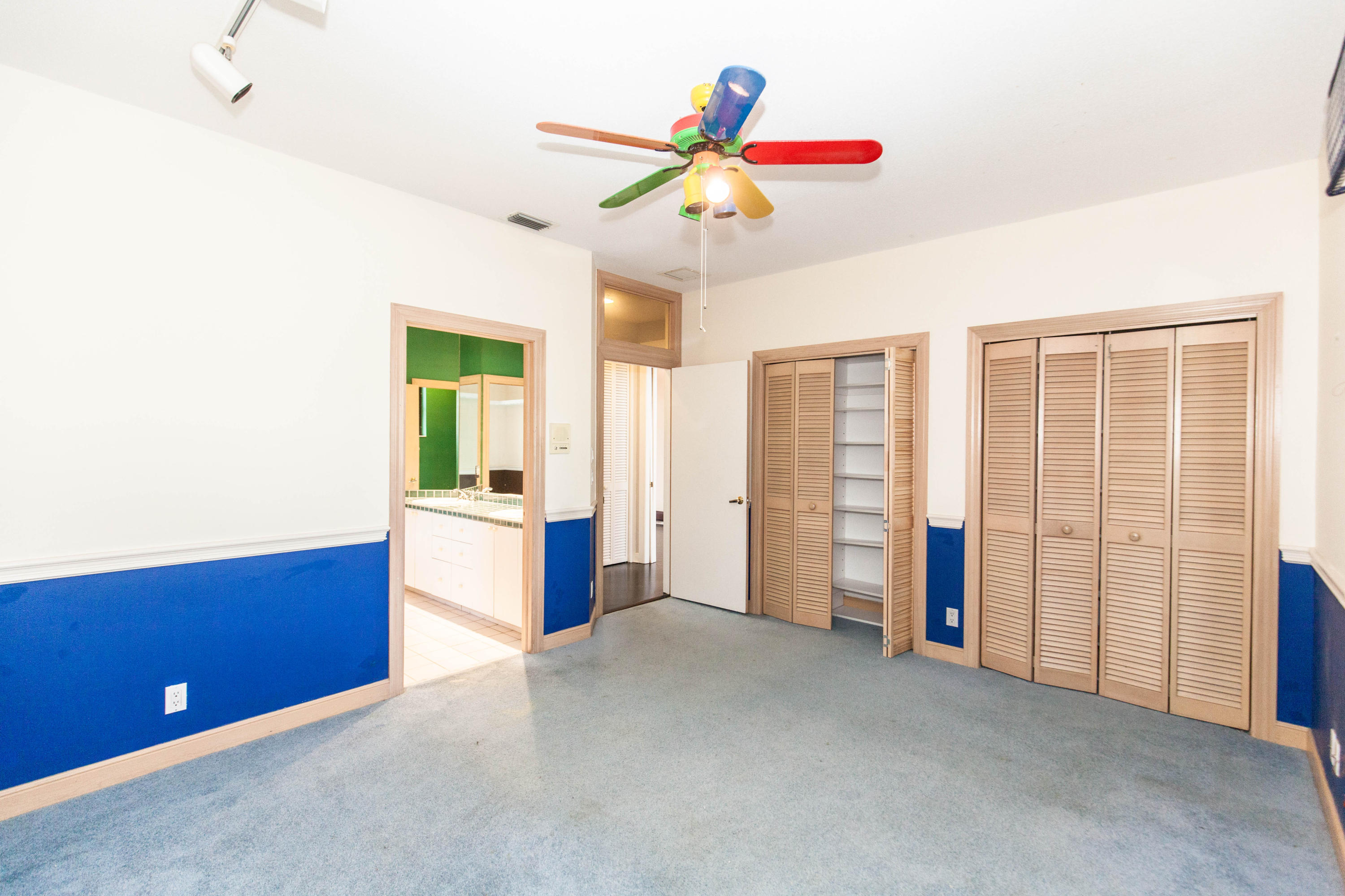 6087 Northwest 23rd Terrace Boca Raton, FL 33496 - Photo 31 of 64 a view of an empty room with a window