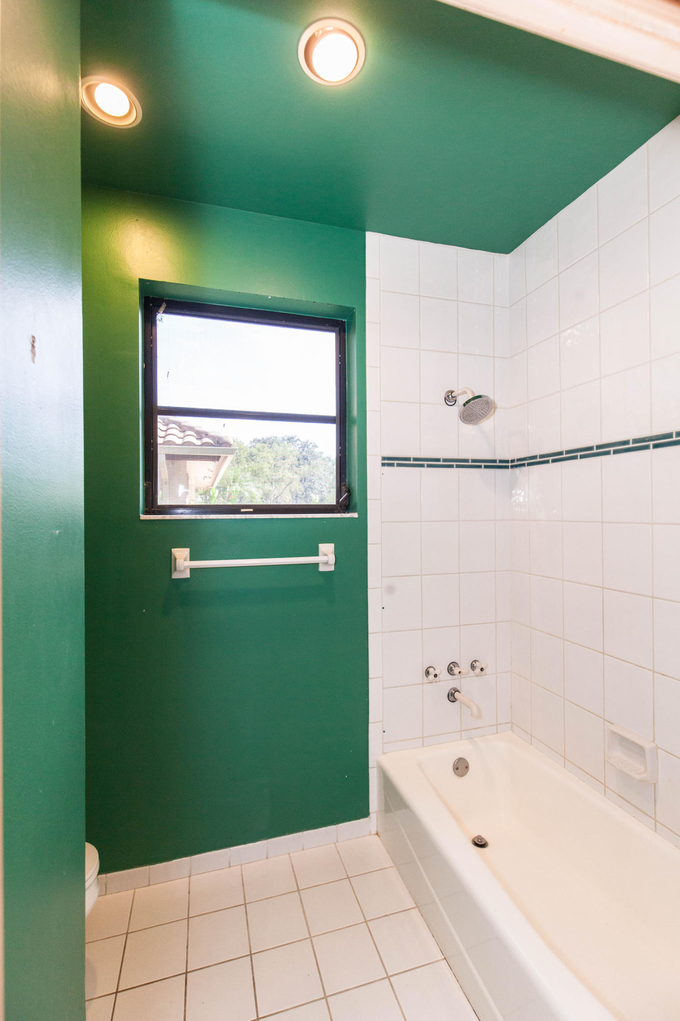 6087 Northwest 23rd Terrace Boca Raton, FL 33496 - Photo 33 of 64 a bathroom with a bathtub and a shower